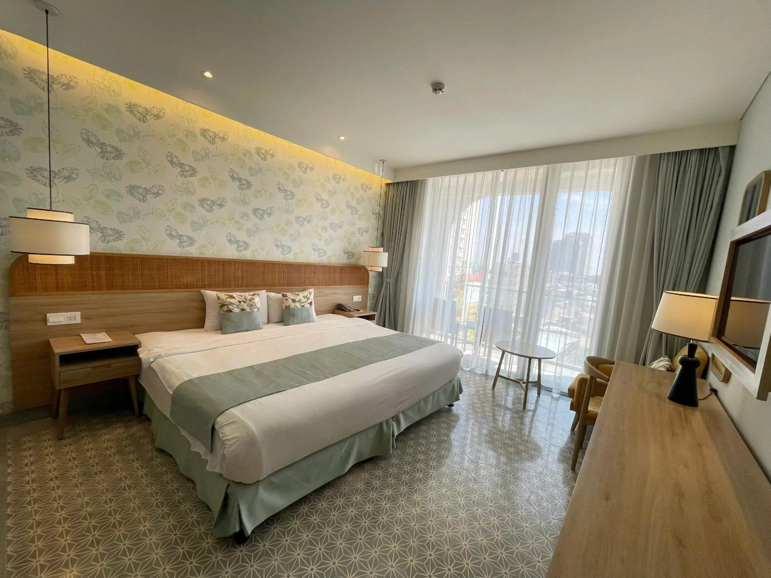 Bed in Cozy Danang Boutique Hotel