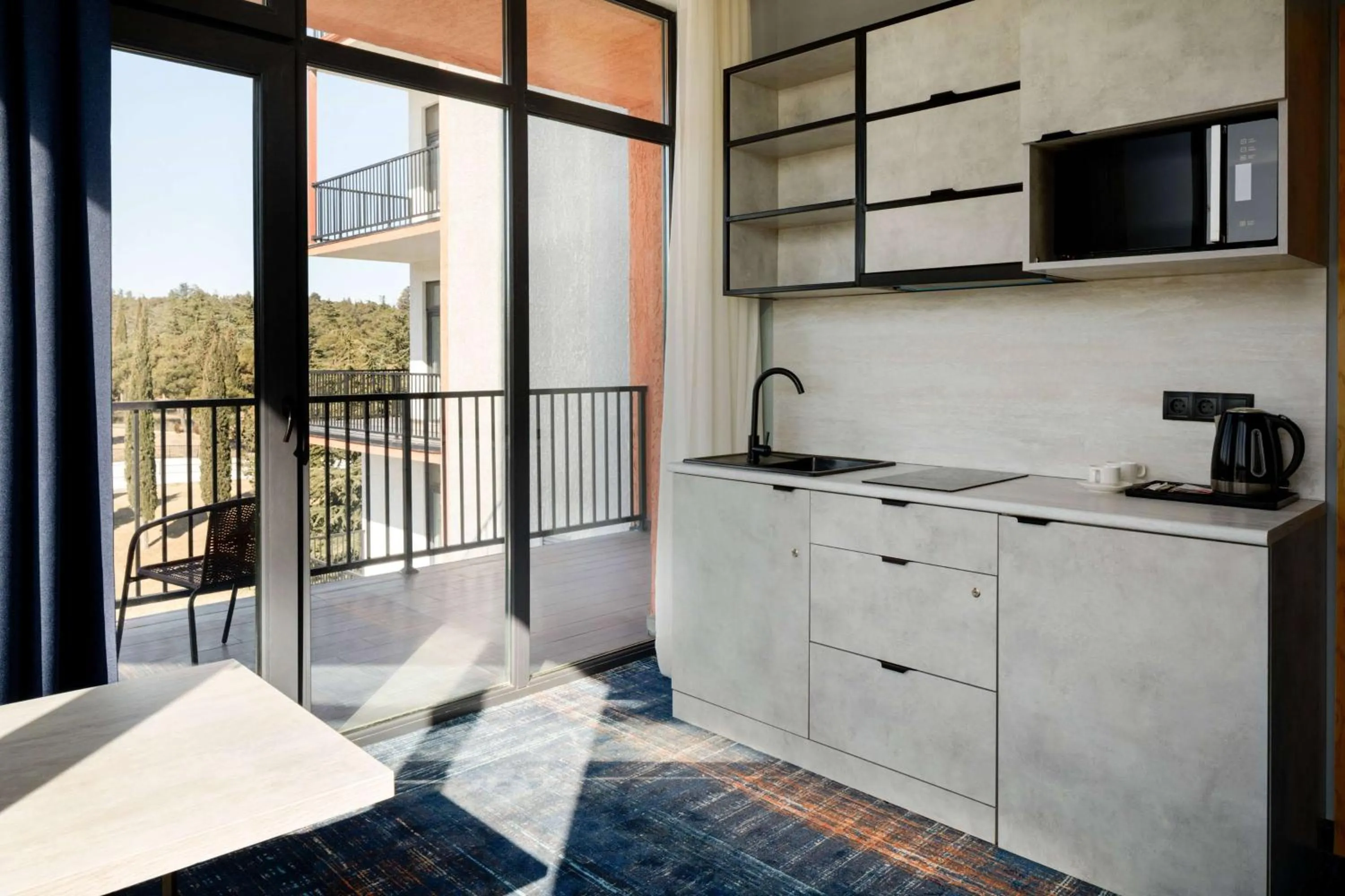 Photo of the whole room in GINO Seaside Tbilisi, Trademark Collection by Wyndham