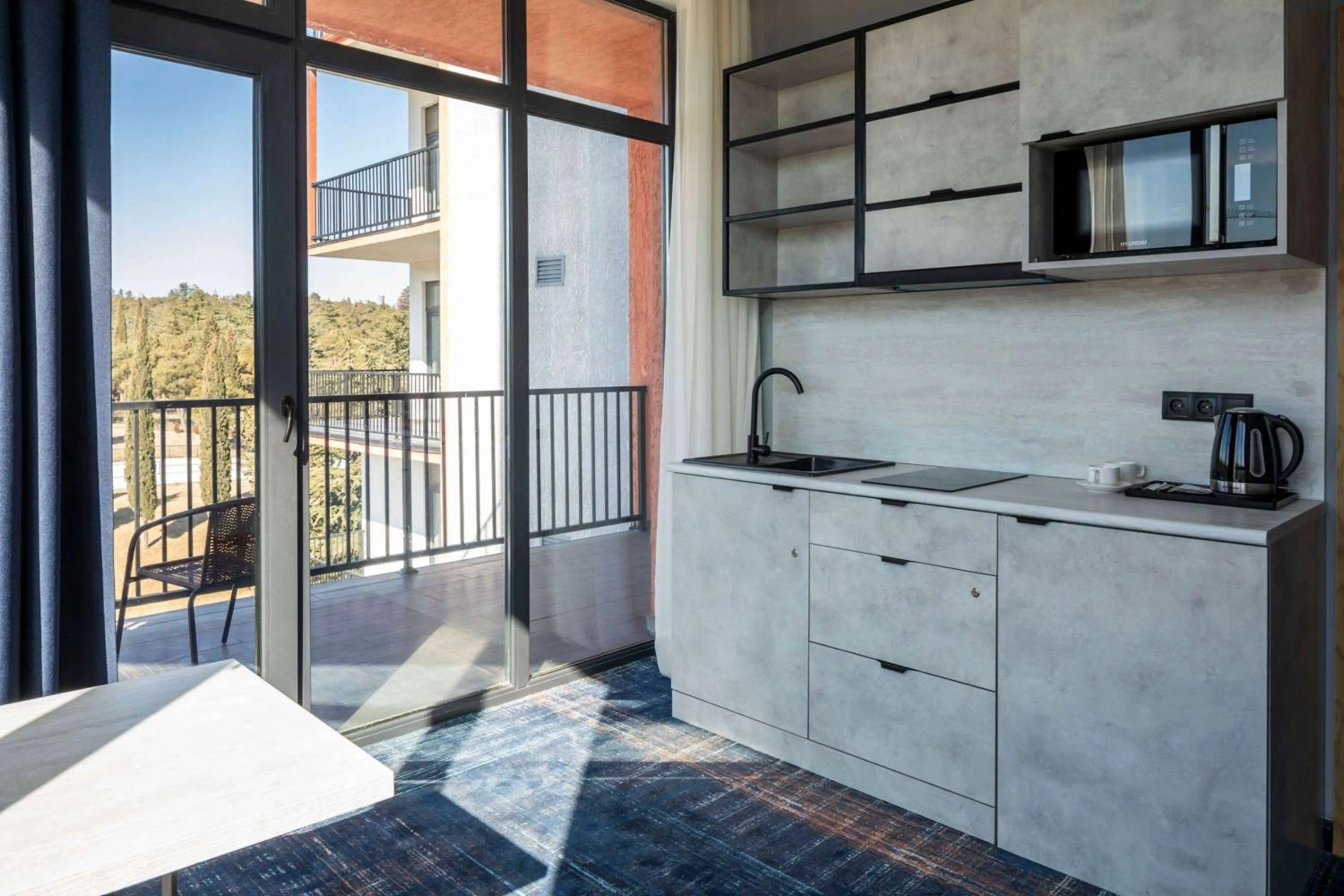 Photo of the whole room in GINO Seaside Tbilisi, Trademark Collection by Wyndham