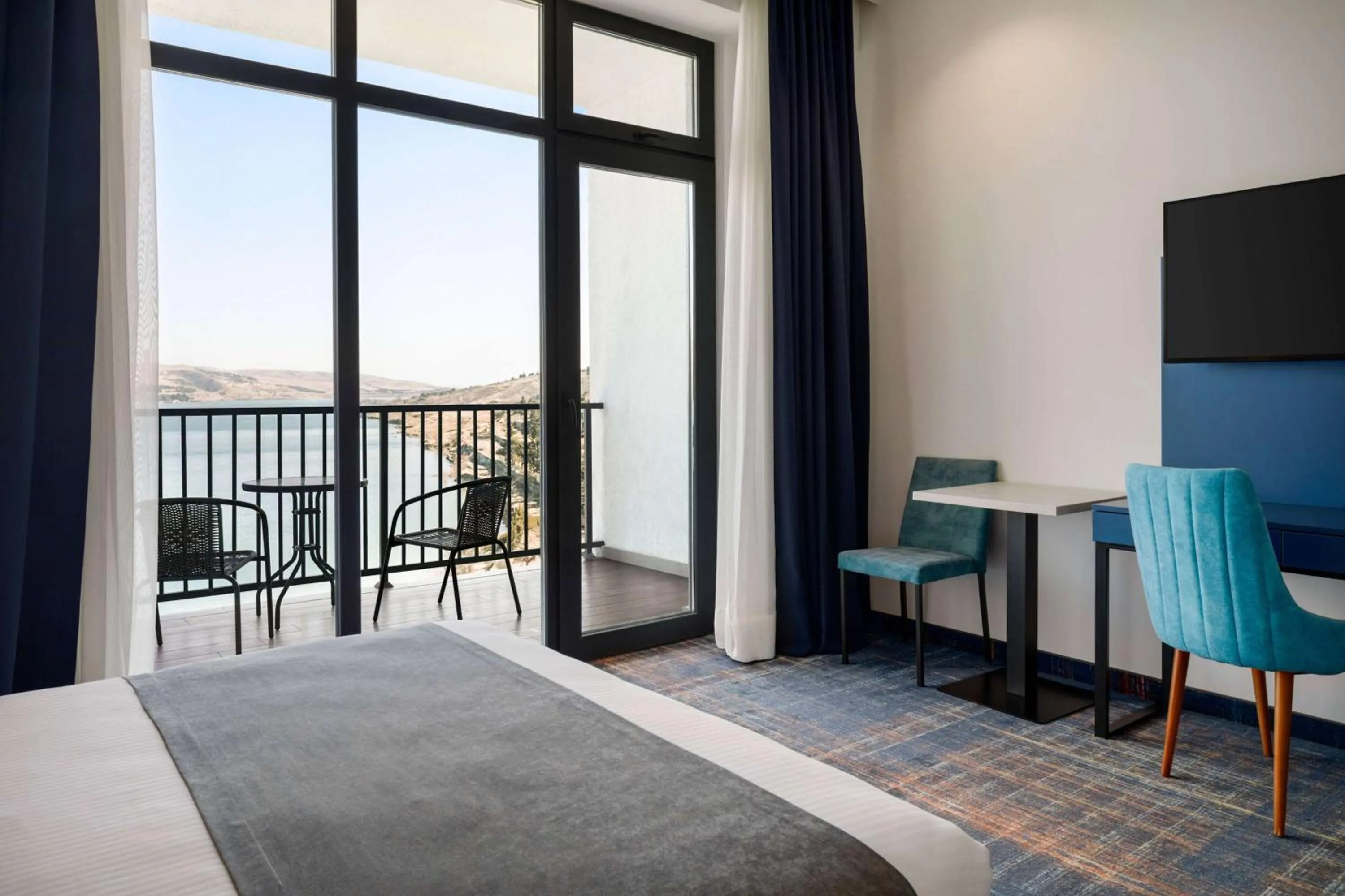 Photo of the whole room, Bed in GINO Seaside Tbilisi, Trademark Collection by Wyndham