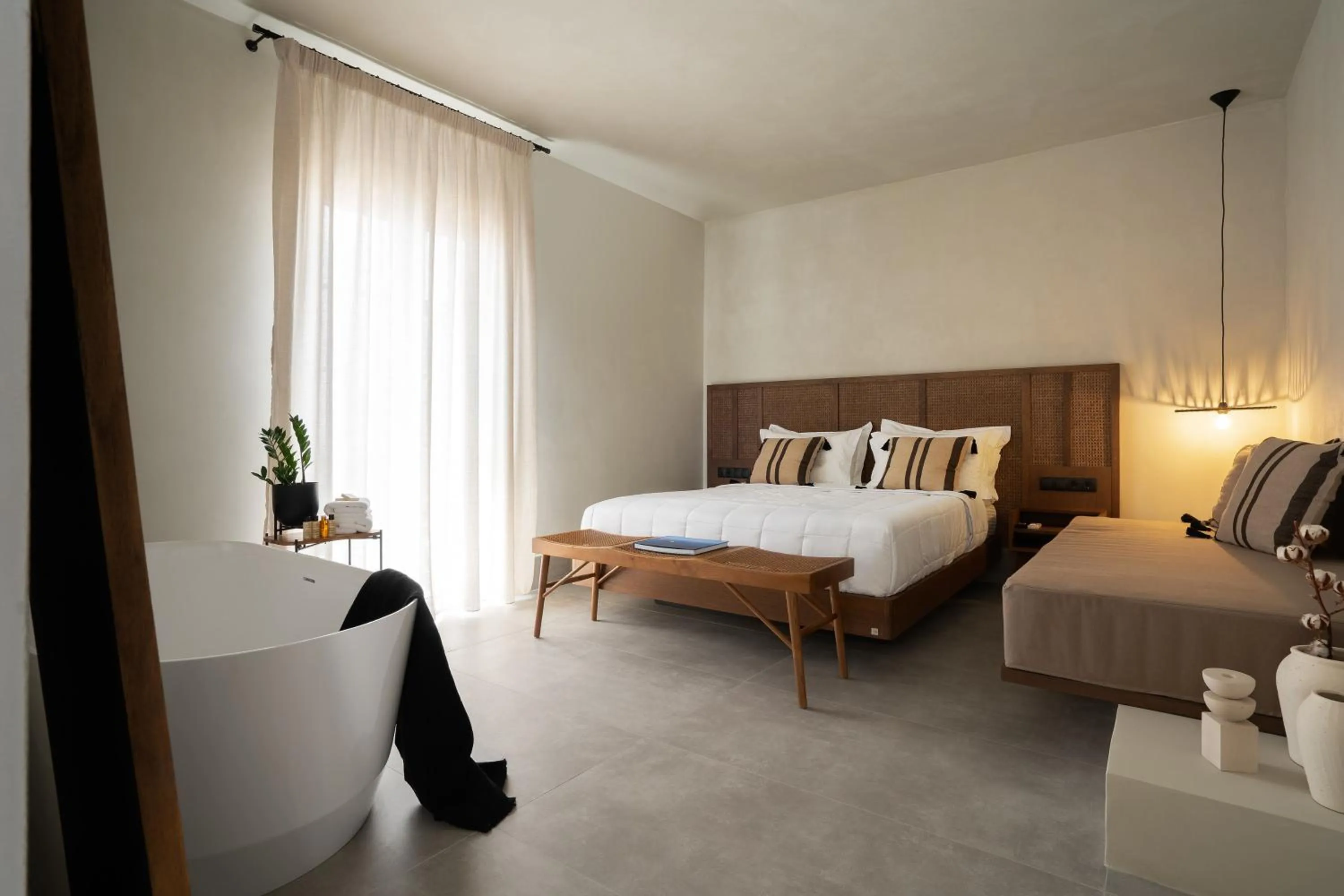 Bed in Polis of Naxos Stylish Suites