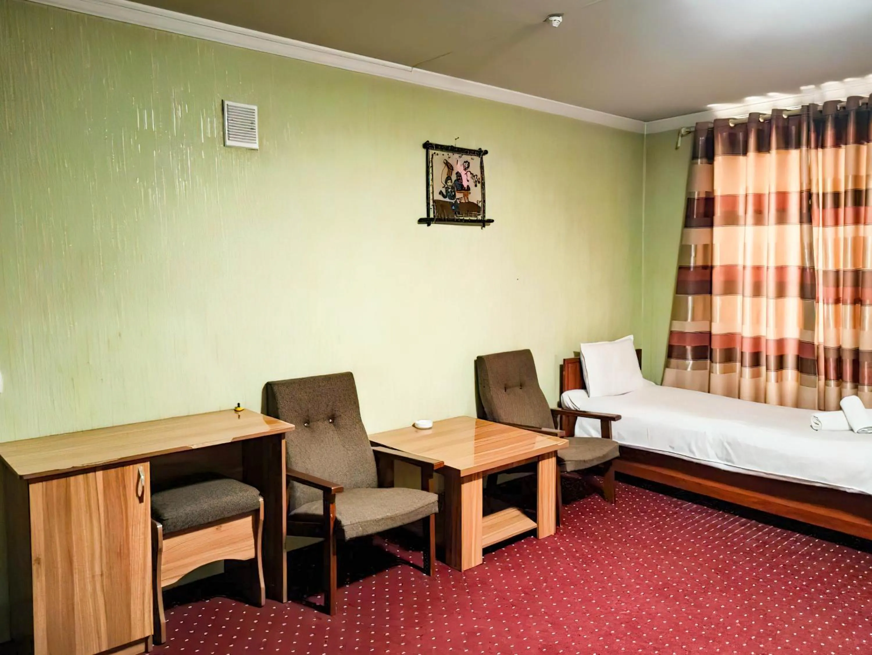 Photo of the whole room, Bed in Reikartz City Kokand