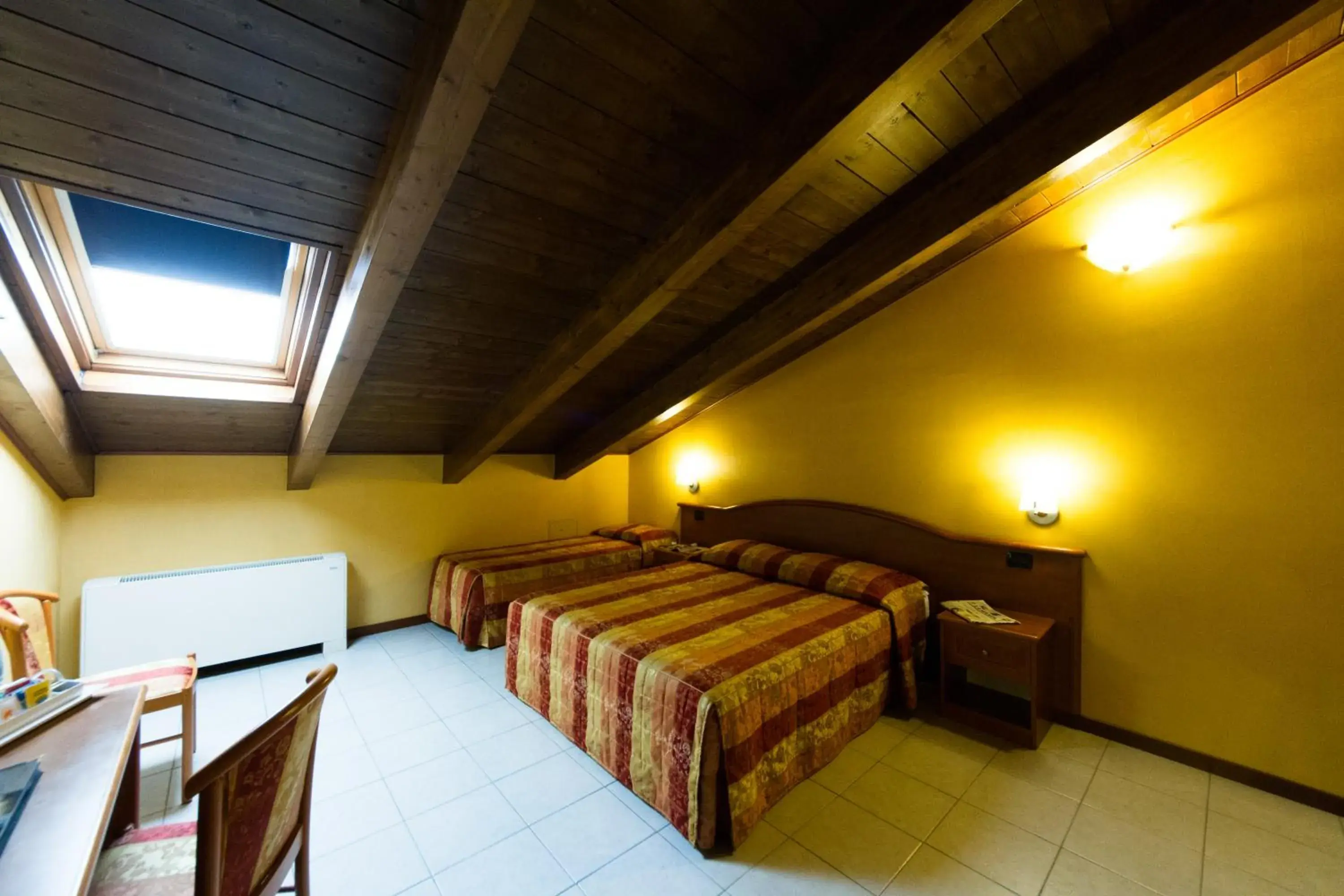 Standard Triple Room in Vald Hotel Standard Triple Room in Vald Hotel