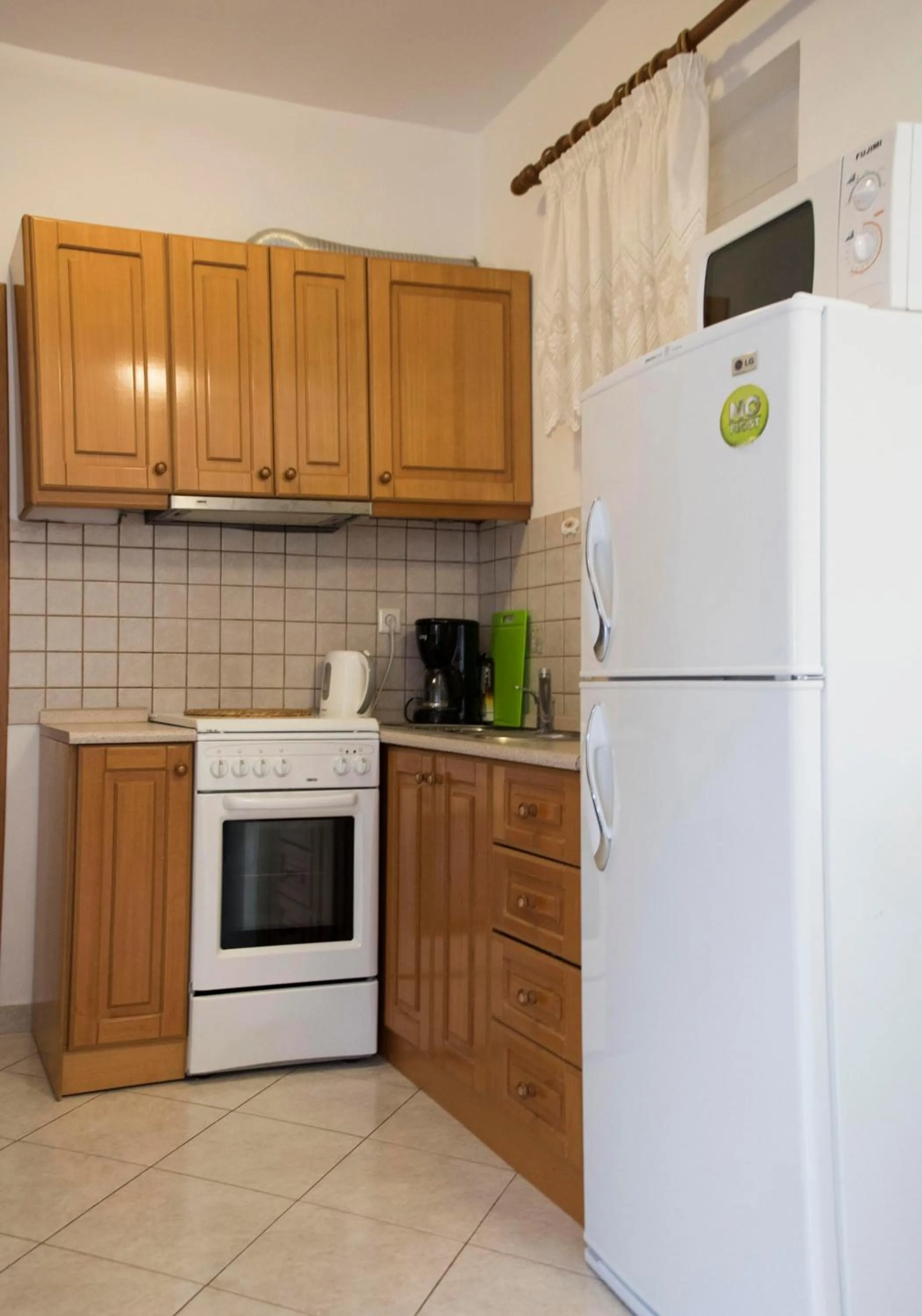 Kitchen or kitchenette in Nephele Apartments