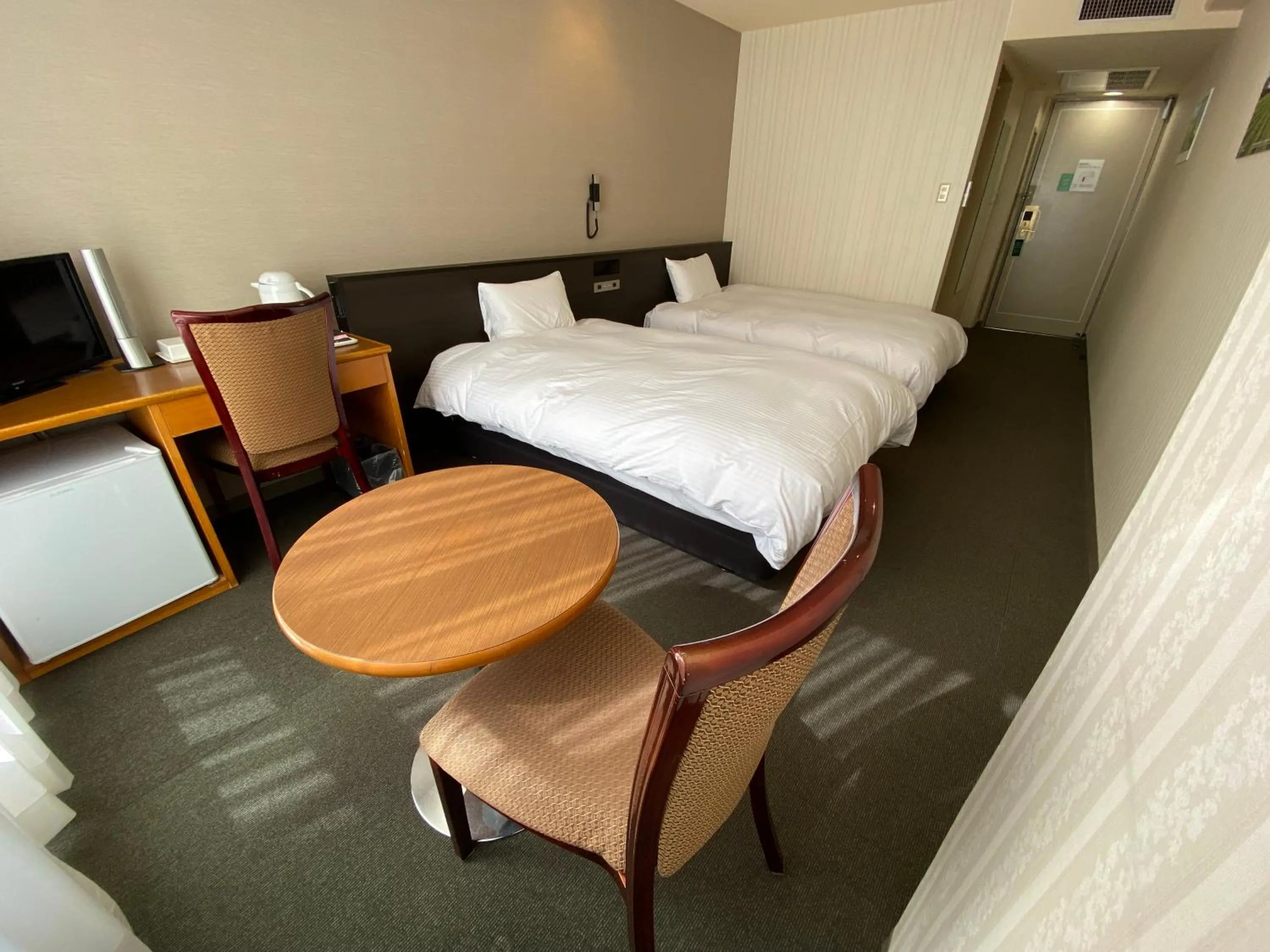 Bed in Hotel Continental Fuchu
