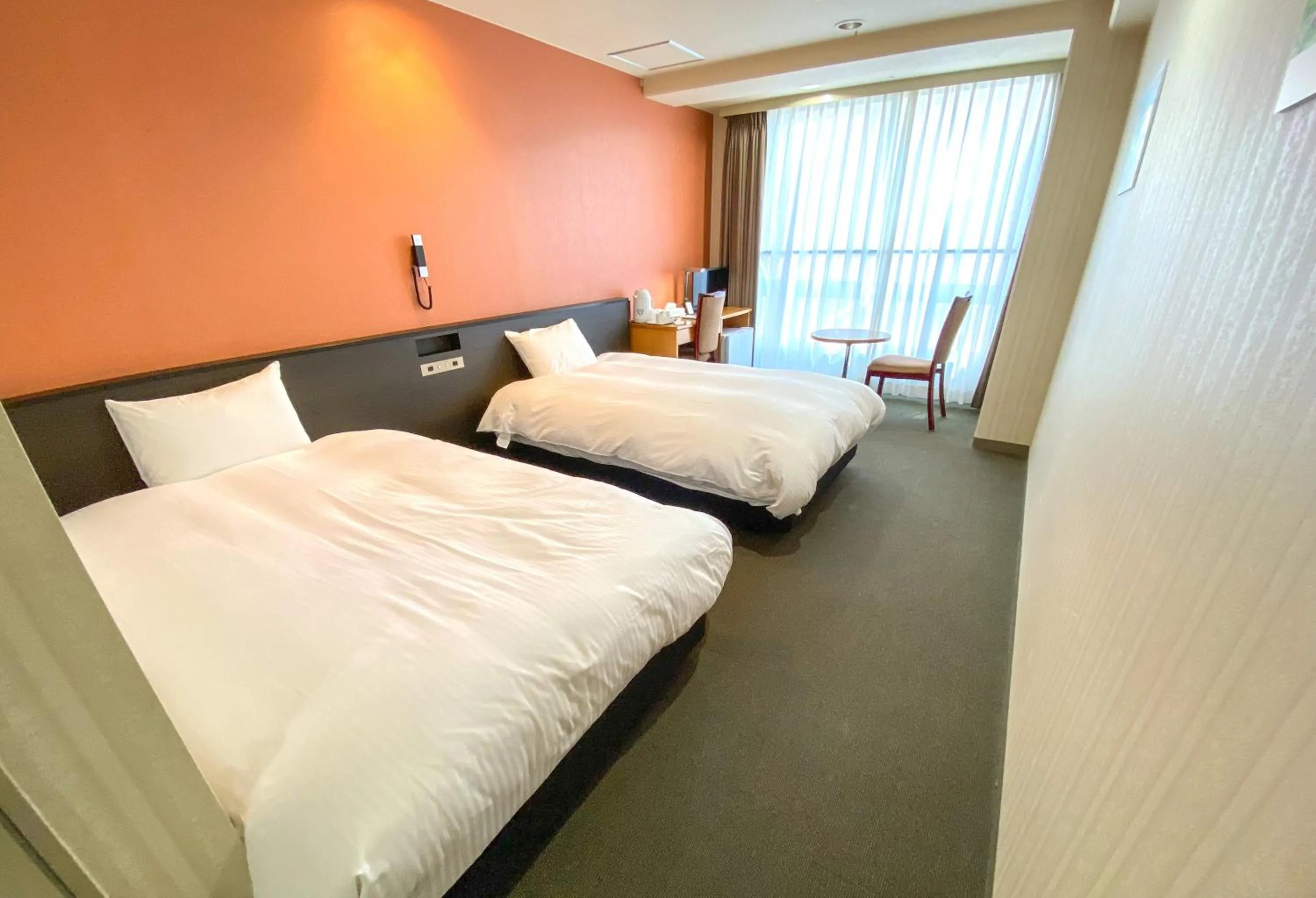 Bed in Hotel Continental Fuchu