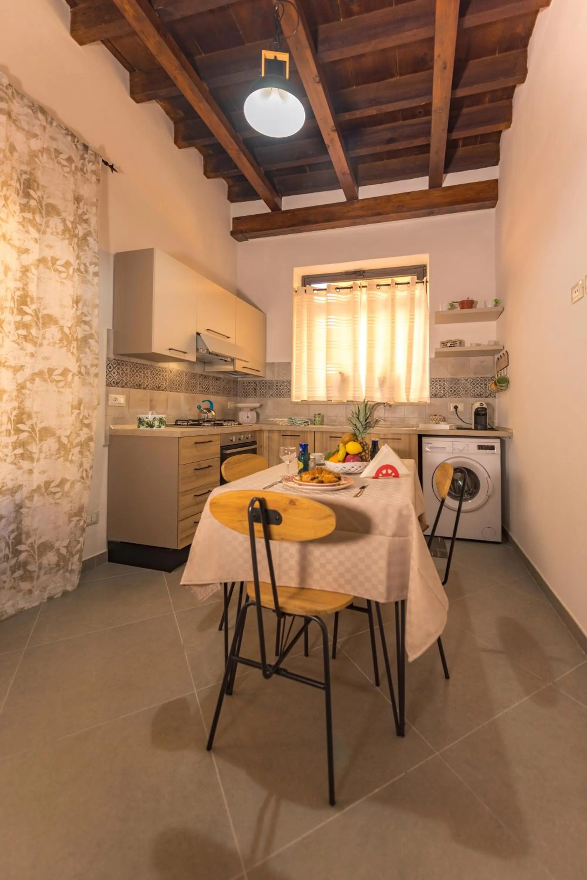 kitchen in AMUNI' Apartments