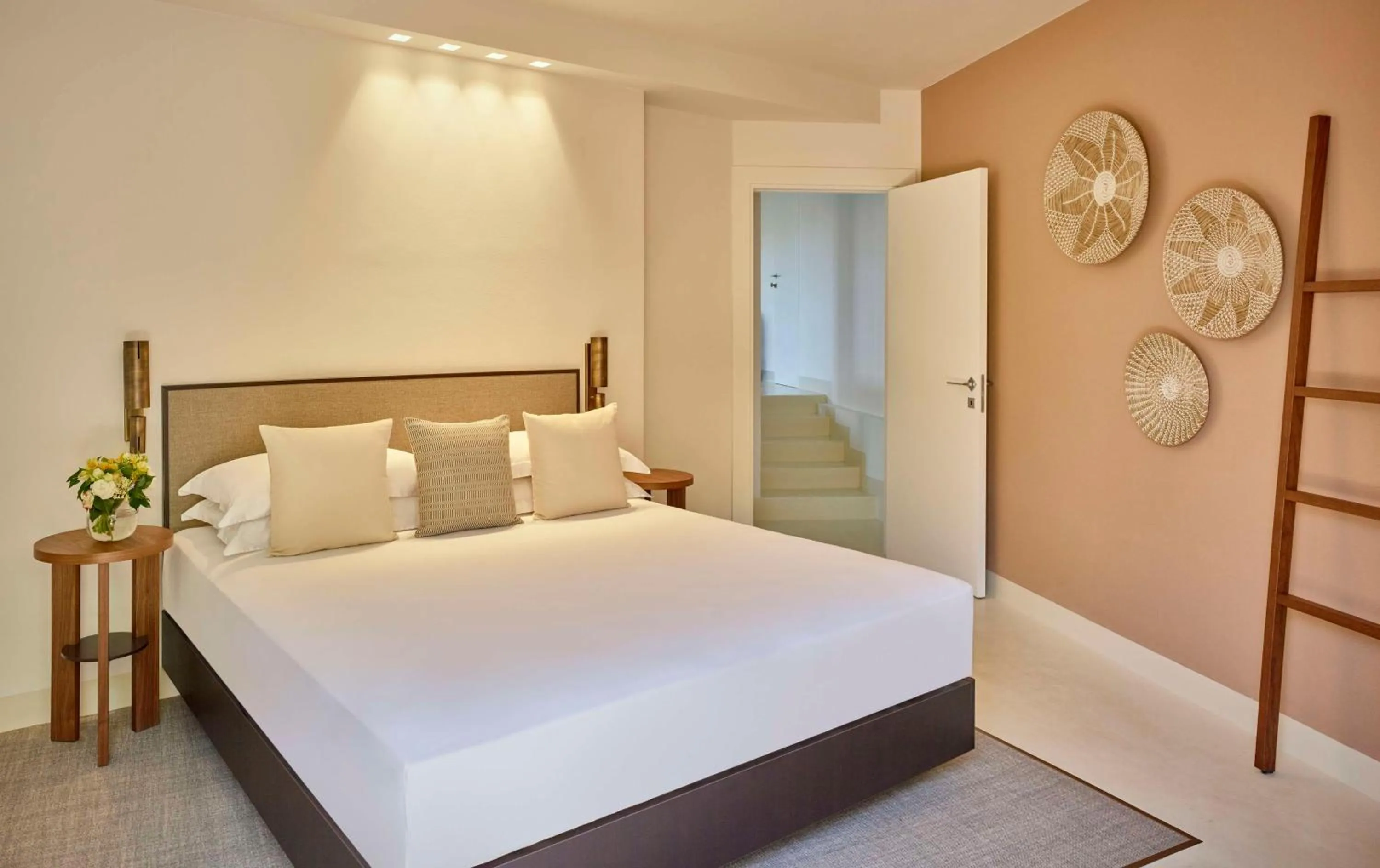 Bed in Baia Di Chia Resort Sardinia, Curio Collection By Hilton