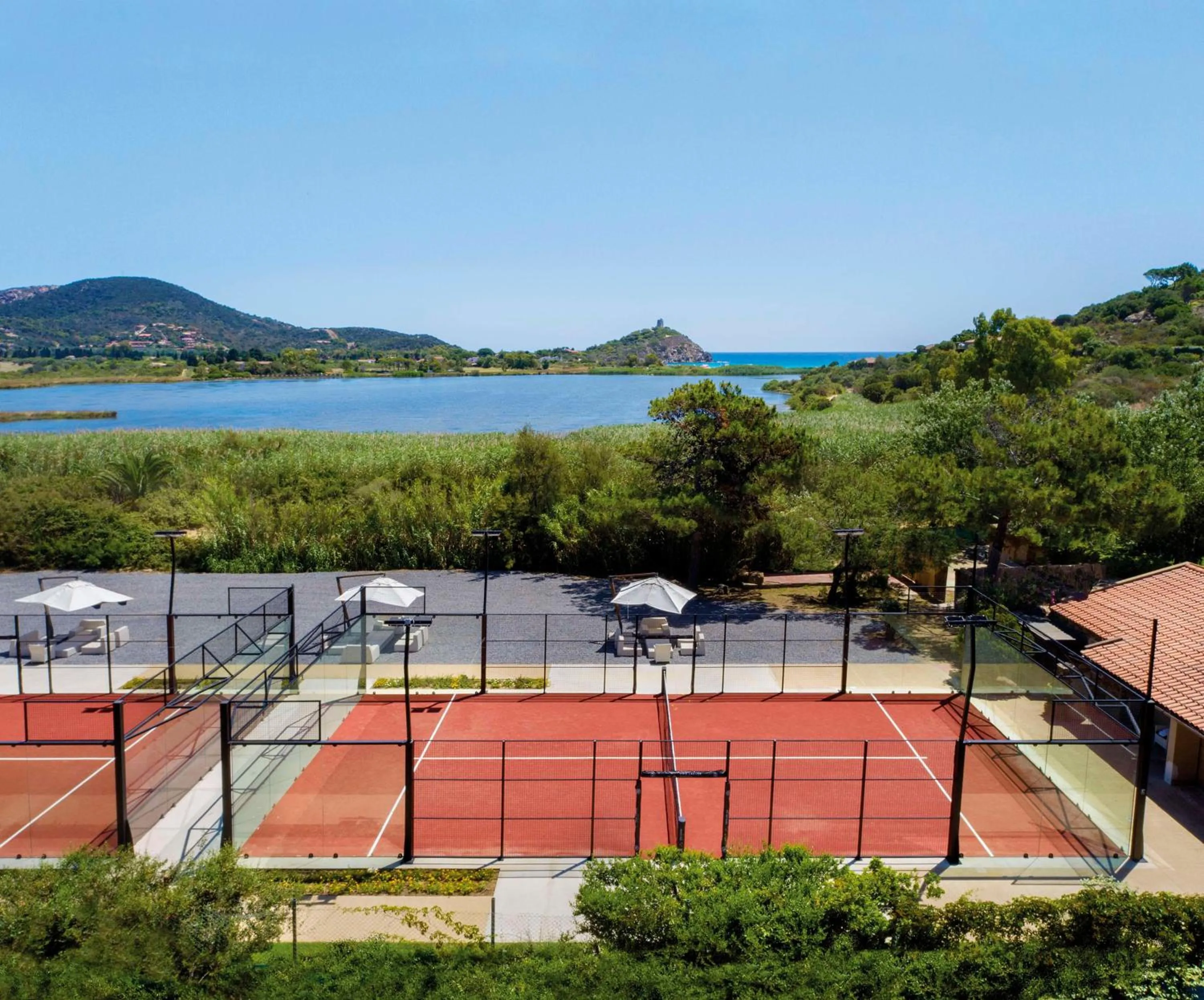 Sports in Baia Di Chia Resort Sardinia, Curio Collection By Hilton