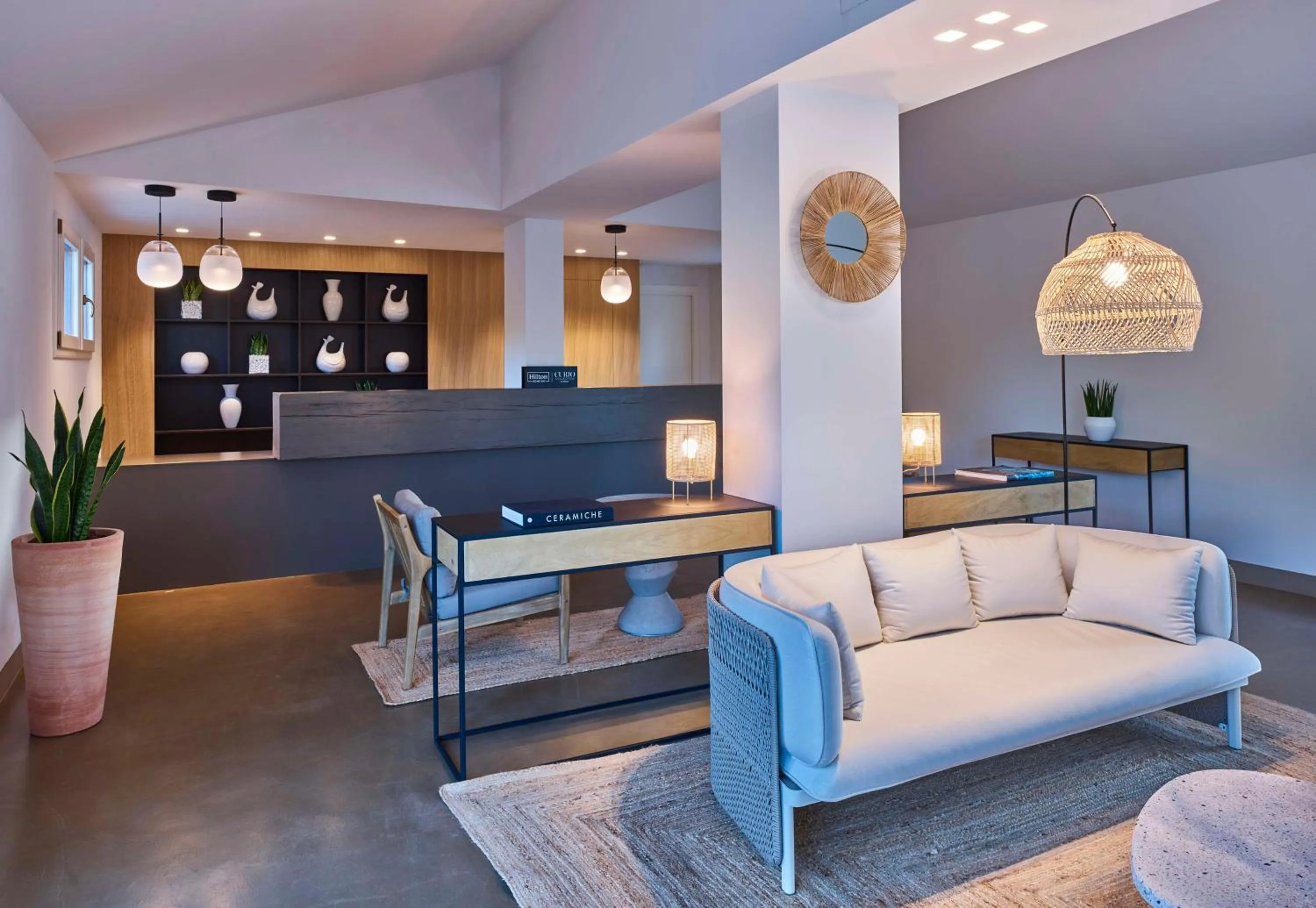 Lobby or reception in Baia Di Chia Resort Sardinia, Curio Collection By Hilton