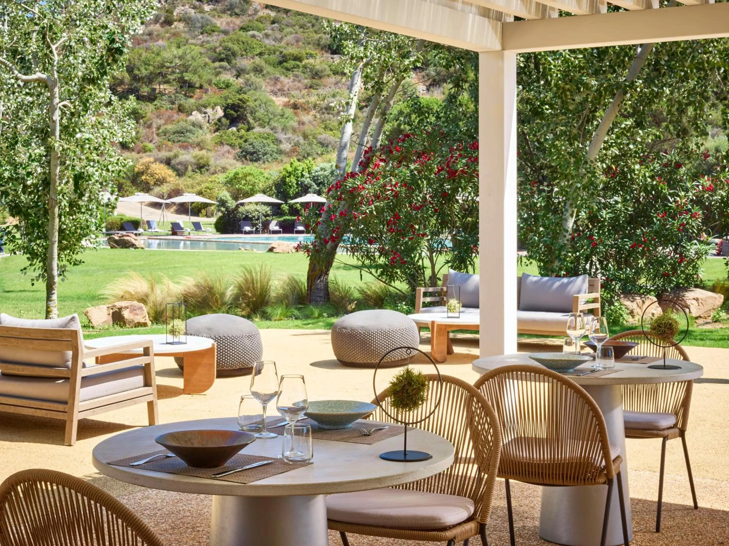 Lounge or bar in Baia Di Chia Resort Sardinia, Curio Collection By Hilton