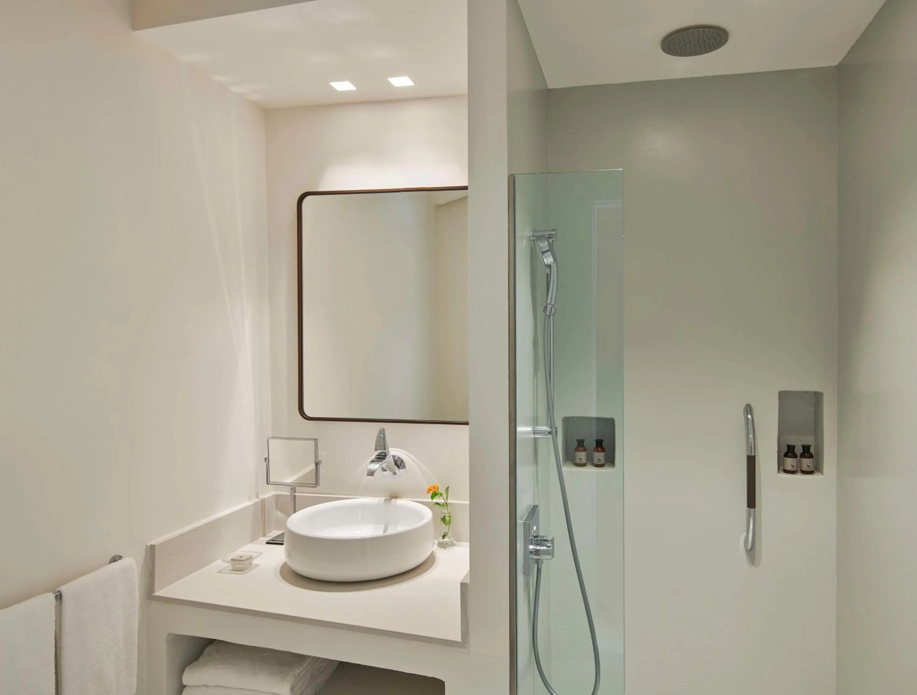 Bathroom in Baia Di Chia Resort Sardinia, Curio Collection By Hilton