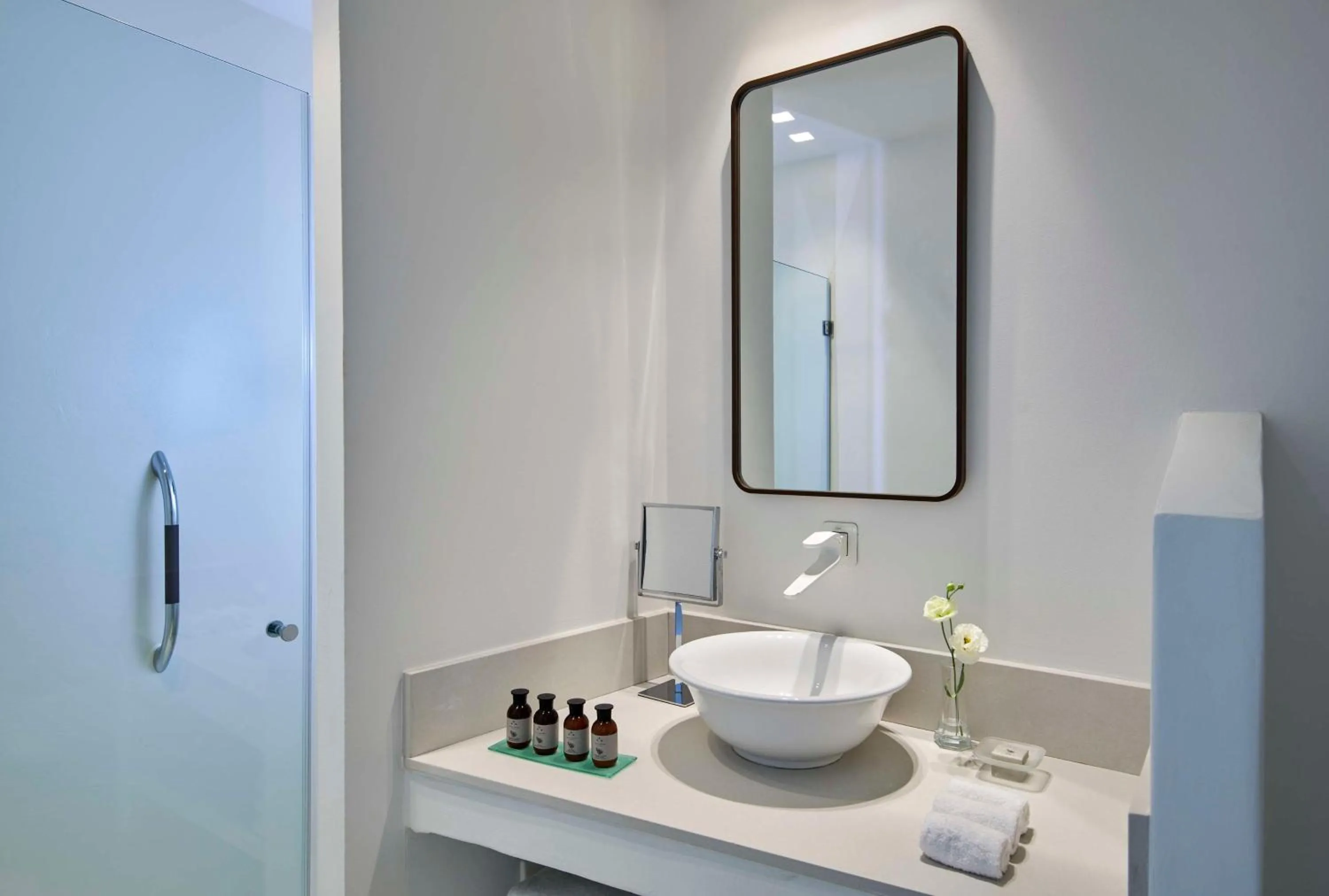 Bathroom in Baia Di Chia Resort Sardinia, Curio Collection By Hilton