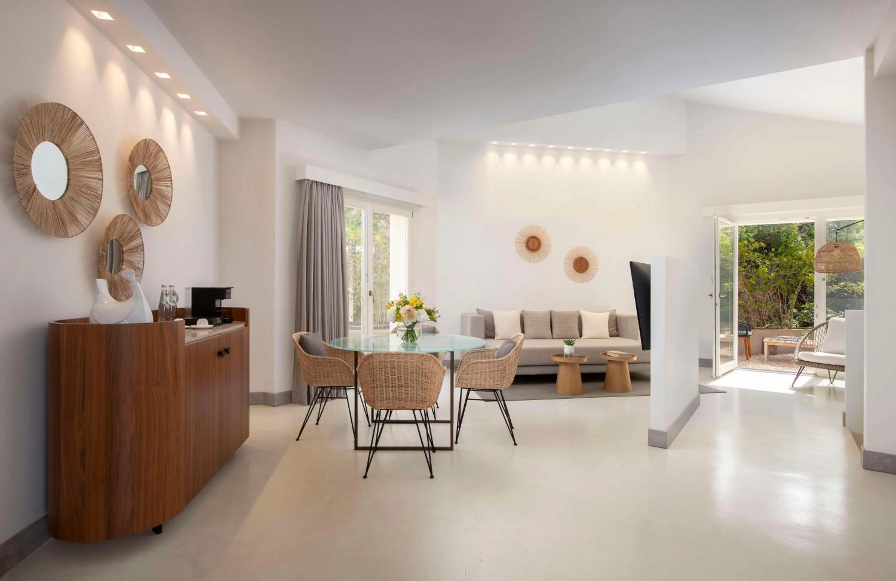 Living room in Baia Di Chia Resort Sardinia, Curio Collection By Hilton