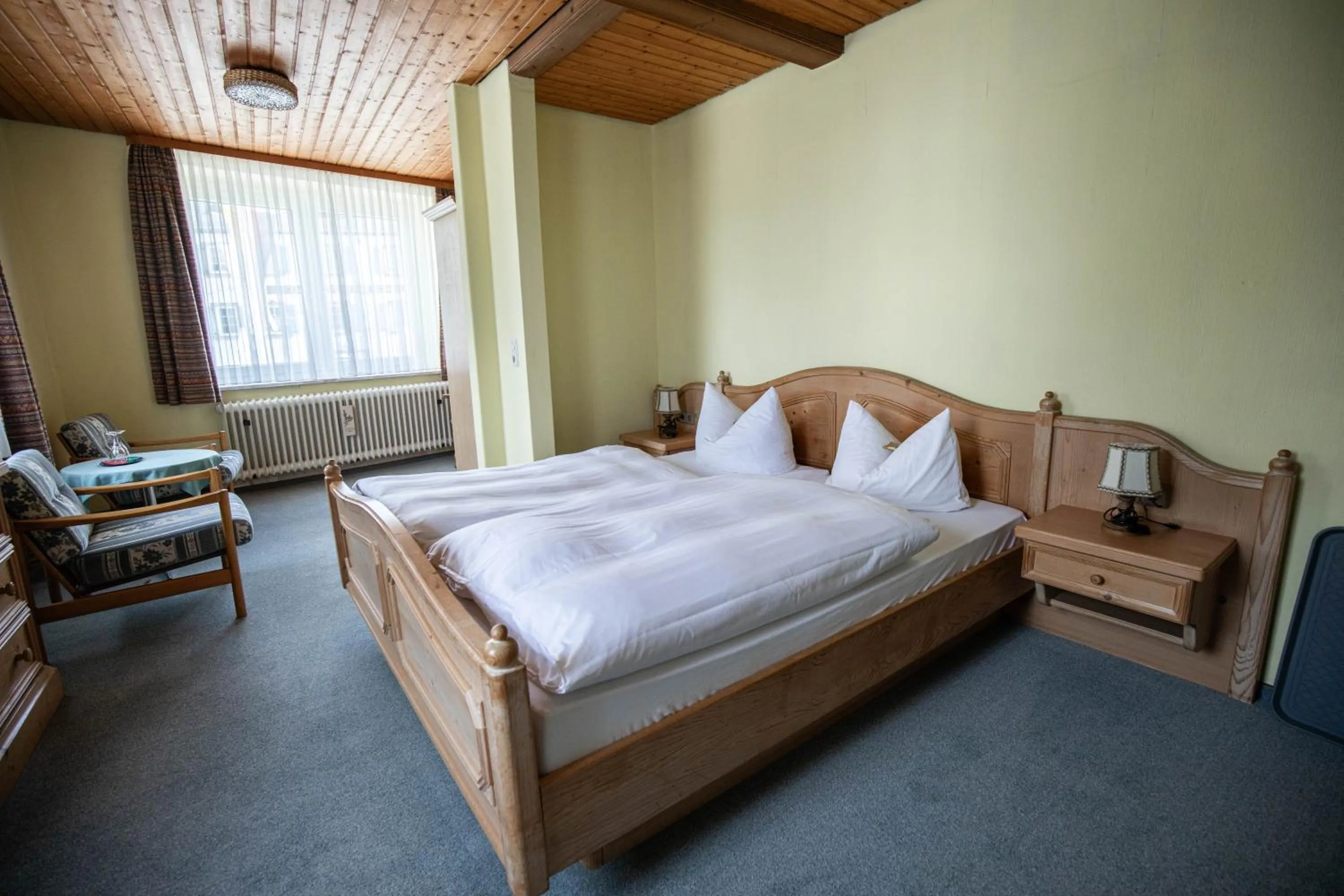 Photo of the whole room, Bed in Landhotel Jägerhof