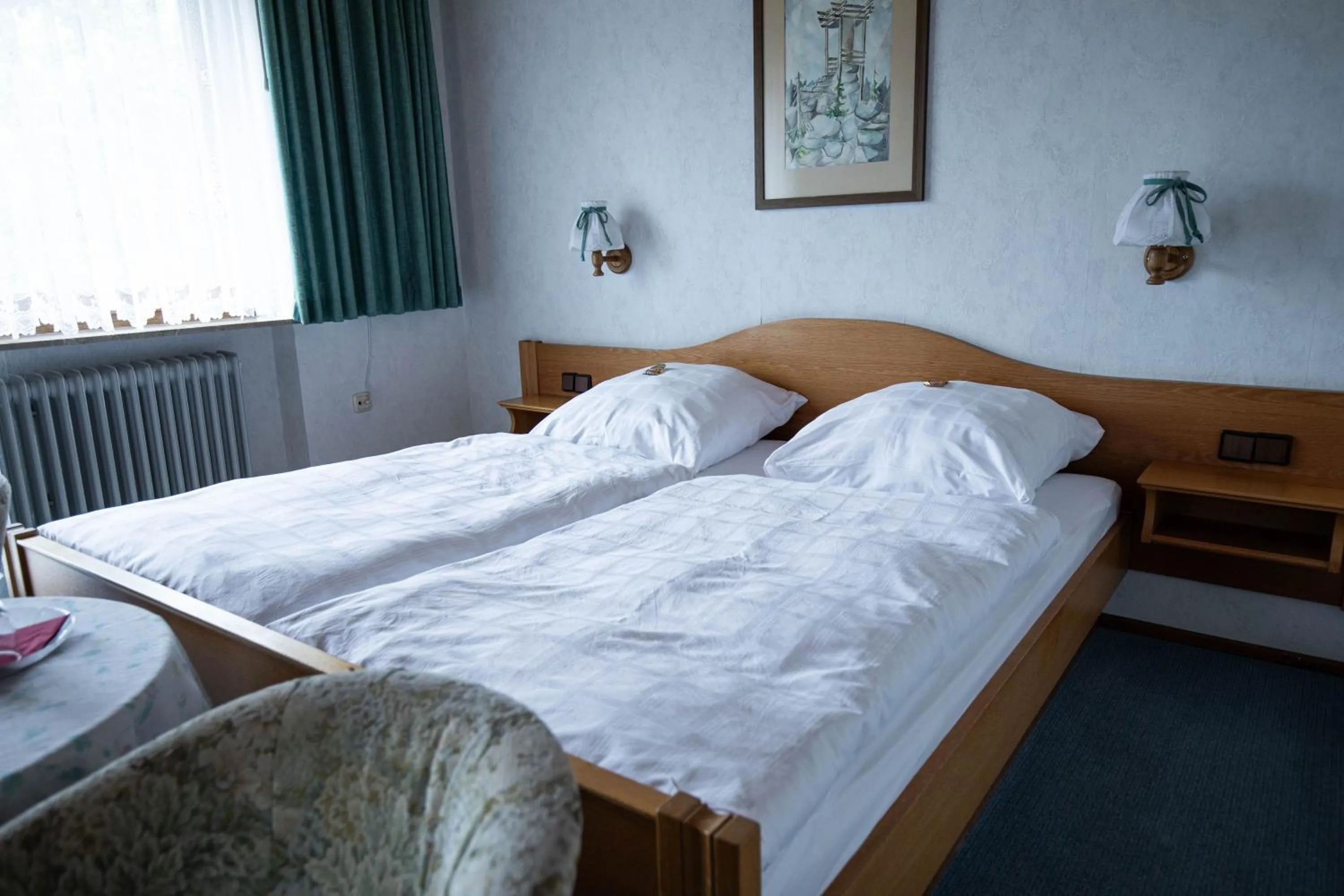 Photo of the whole room, Bed in Landhotel Jägerhof