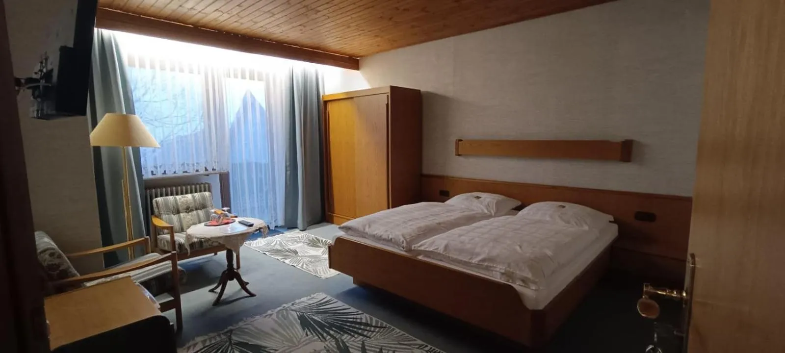 Photo of the whole room, Bed in Landhotel Jägerhof