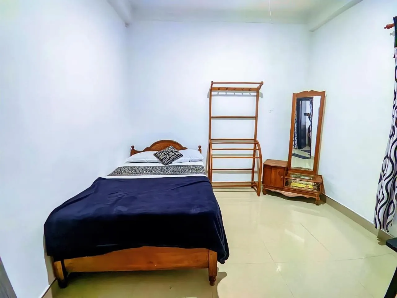 Photo of the whole room, Bed in White Home
