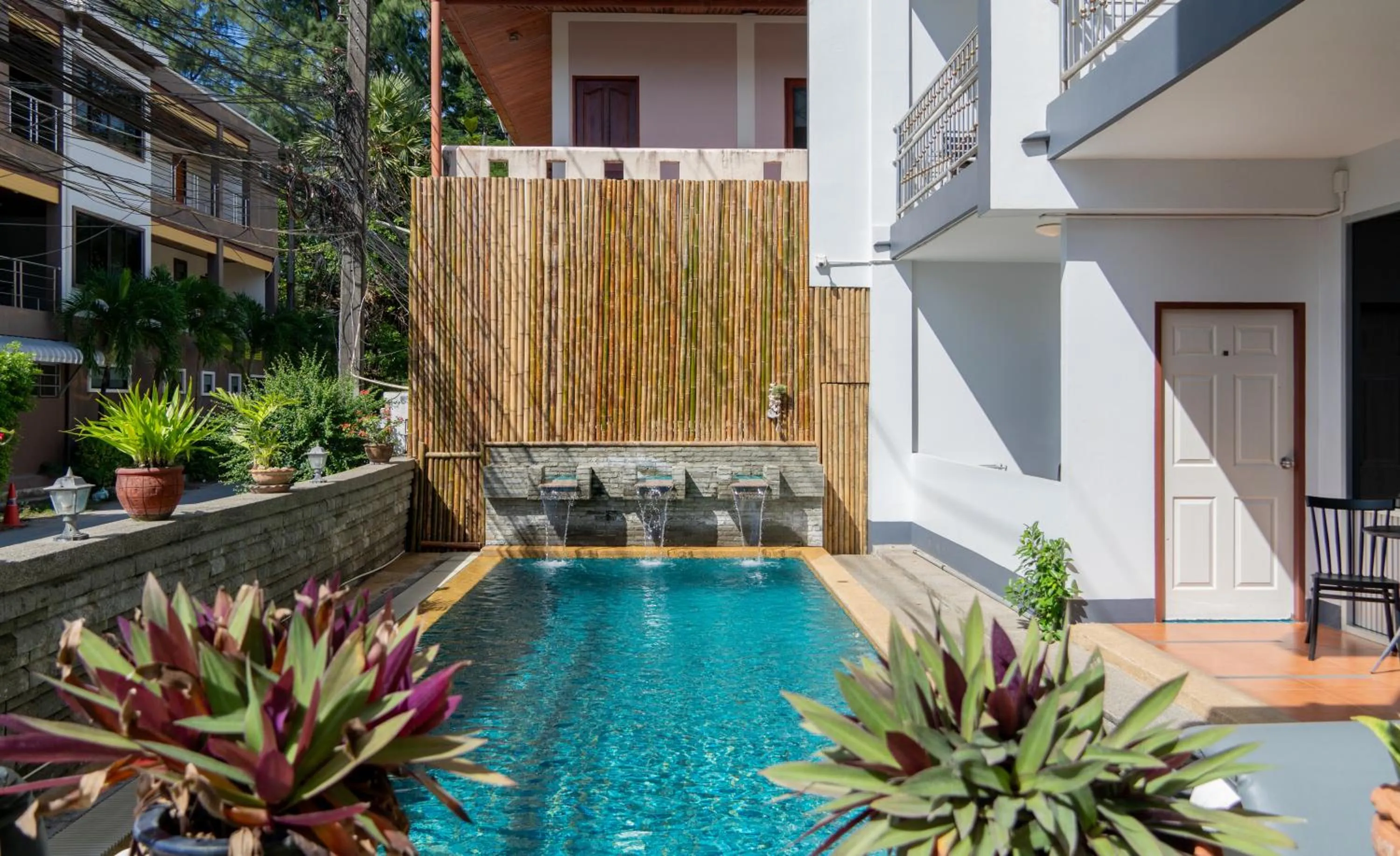 Swimming pool in Deng's kamala beach Guesthouse