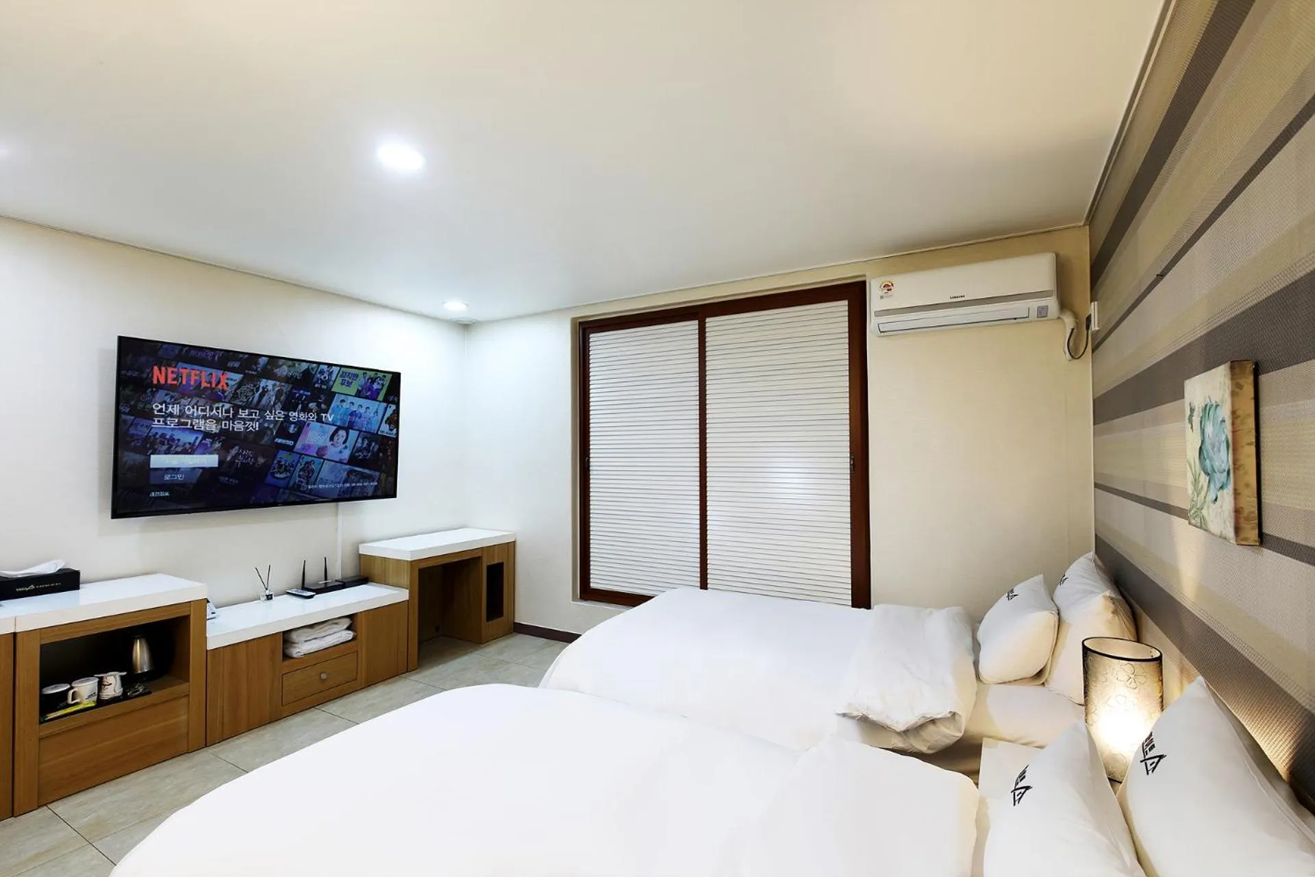 Bed in White Tourist Hotel