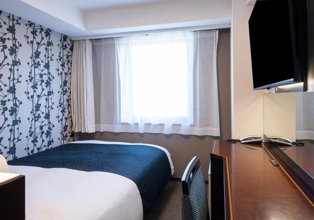 Bed in APA Hotel Haneda Anamori Inari Ekimae