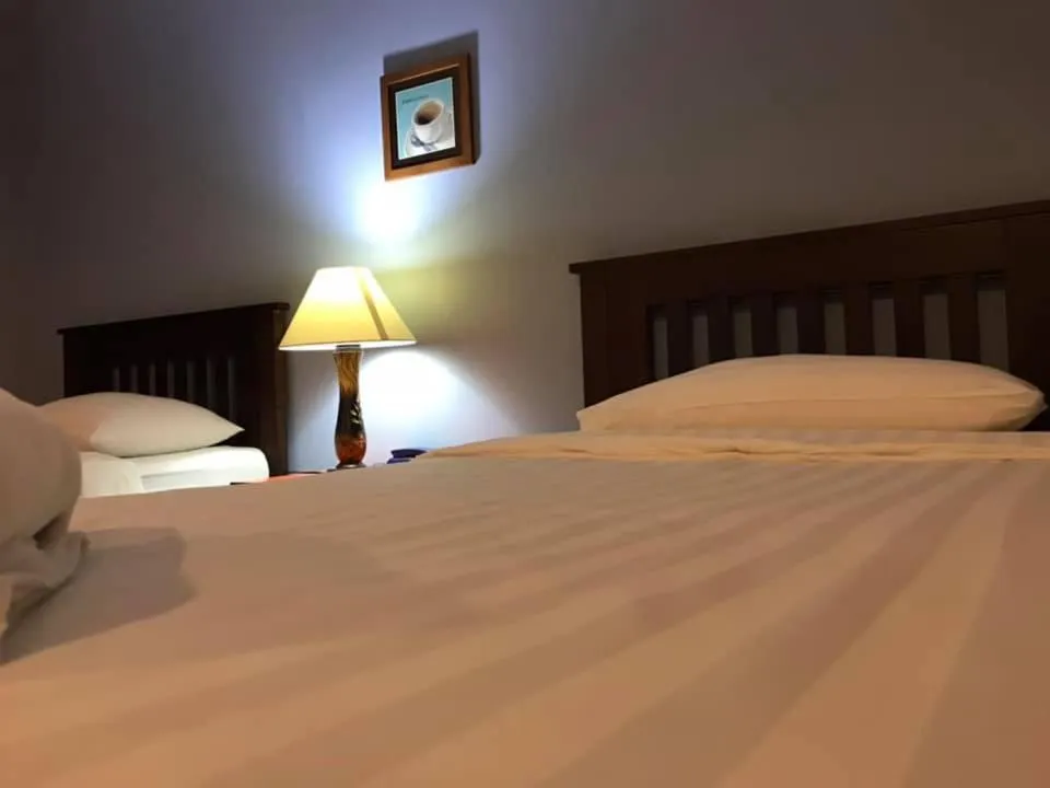 Bed in Mango Bedroom Inn