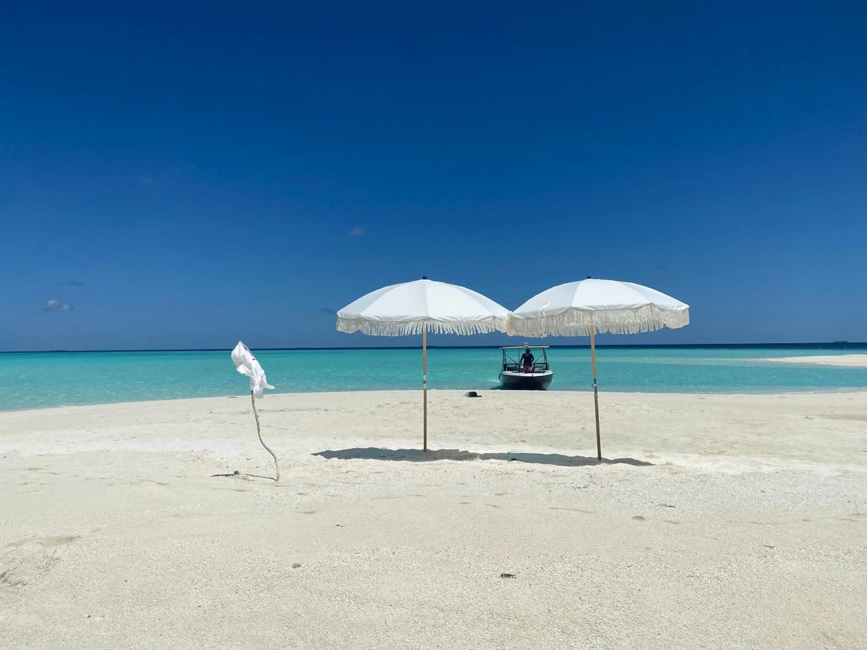 Sunrise by white sand dhigurah