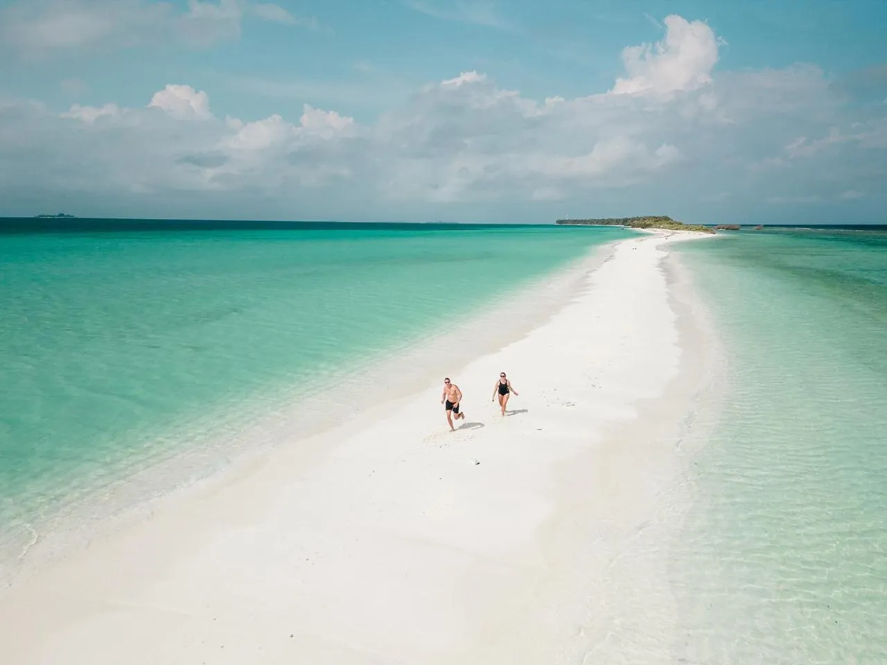 Sunrise by white sand dhigurah