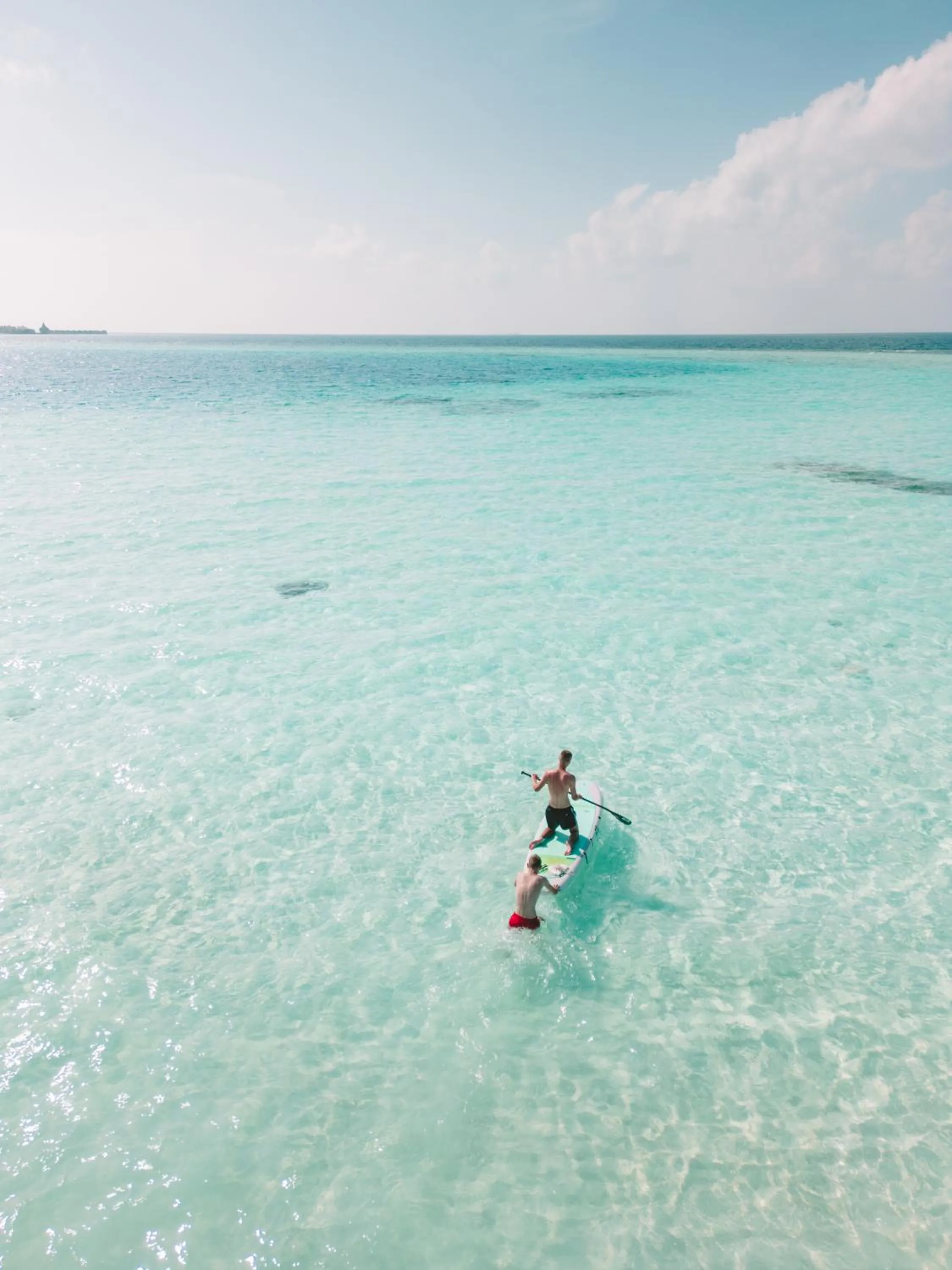 Sunrise by white sand dhigurah