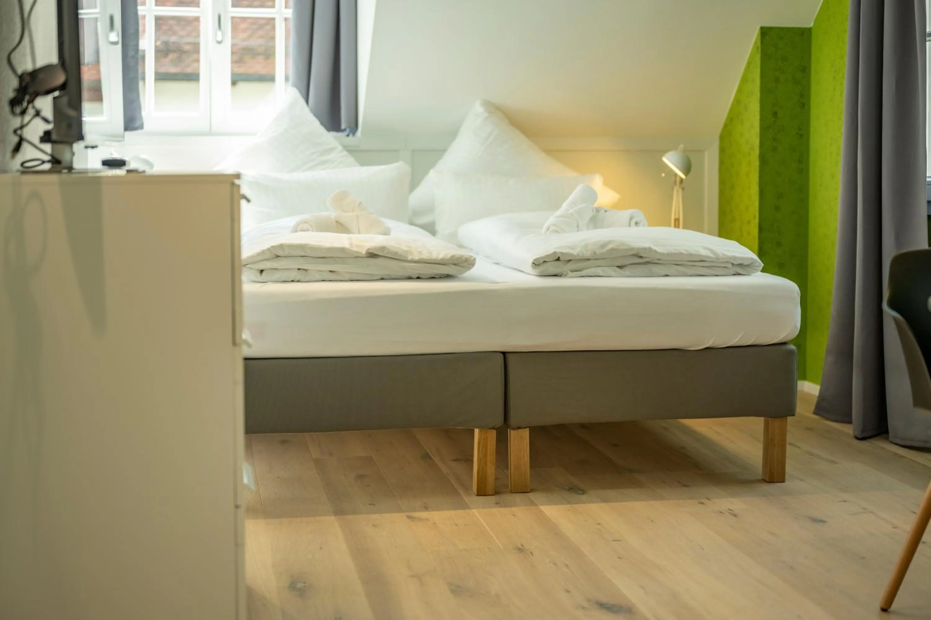 Bed in Gästehaus am Schlossplatz, Z. 4