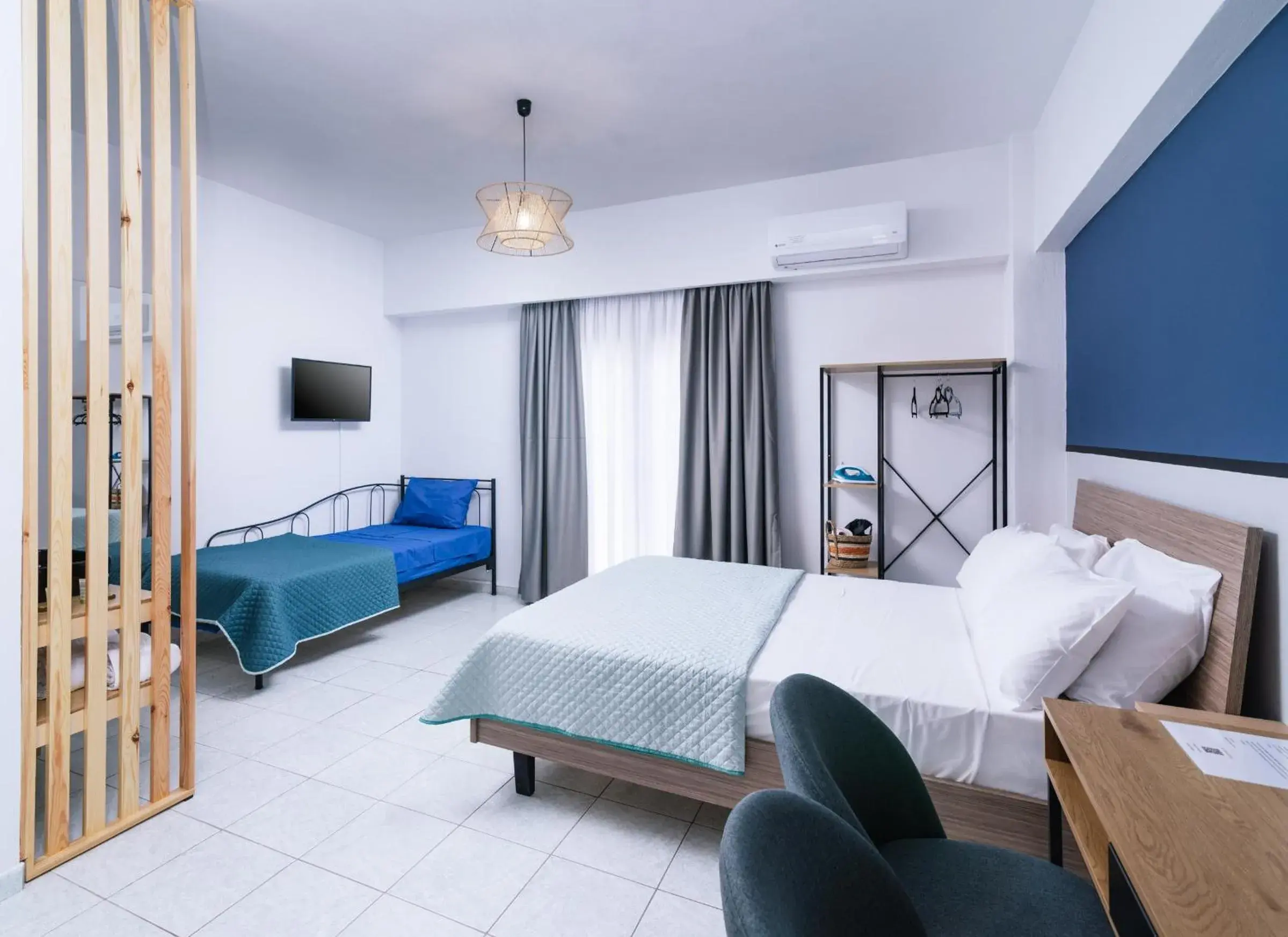 Deluxe Triple Room in Alcyone Studios and Apartments Deluxe Triple Room in Alcyone Studios and Apartments