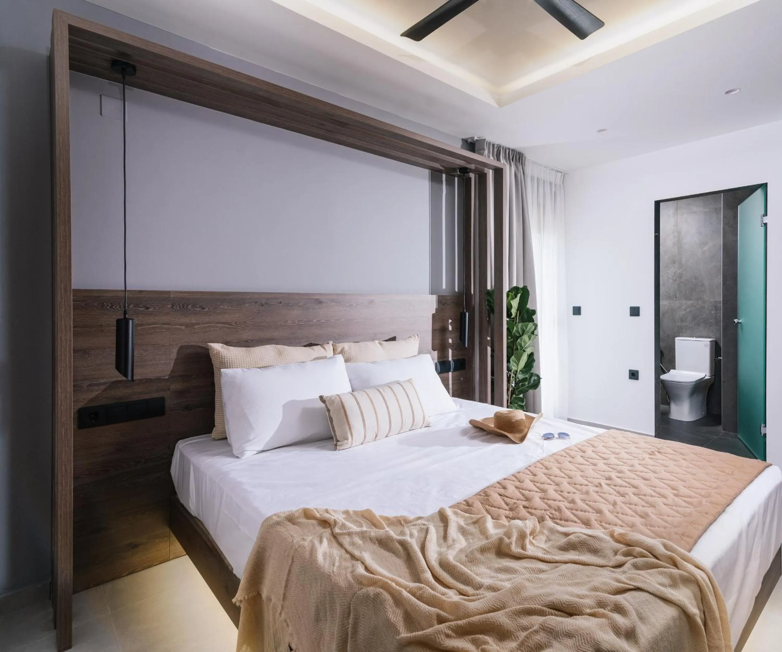 Bed in Alcyone Studios and Apartments