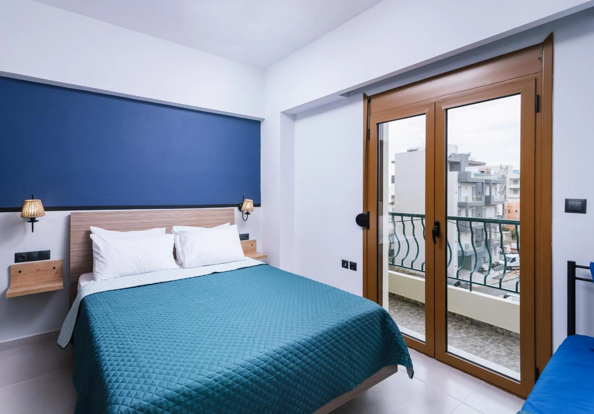 Bed in Alcyone Studios and Apartments