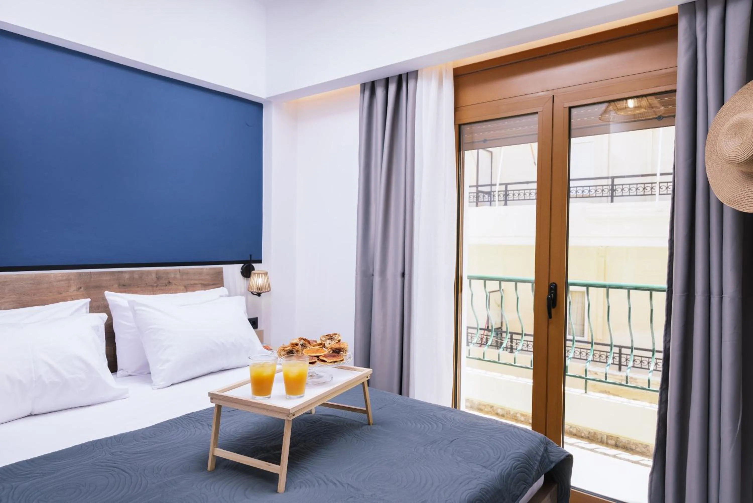 Bed in Alcyone Studios and Apartments