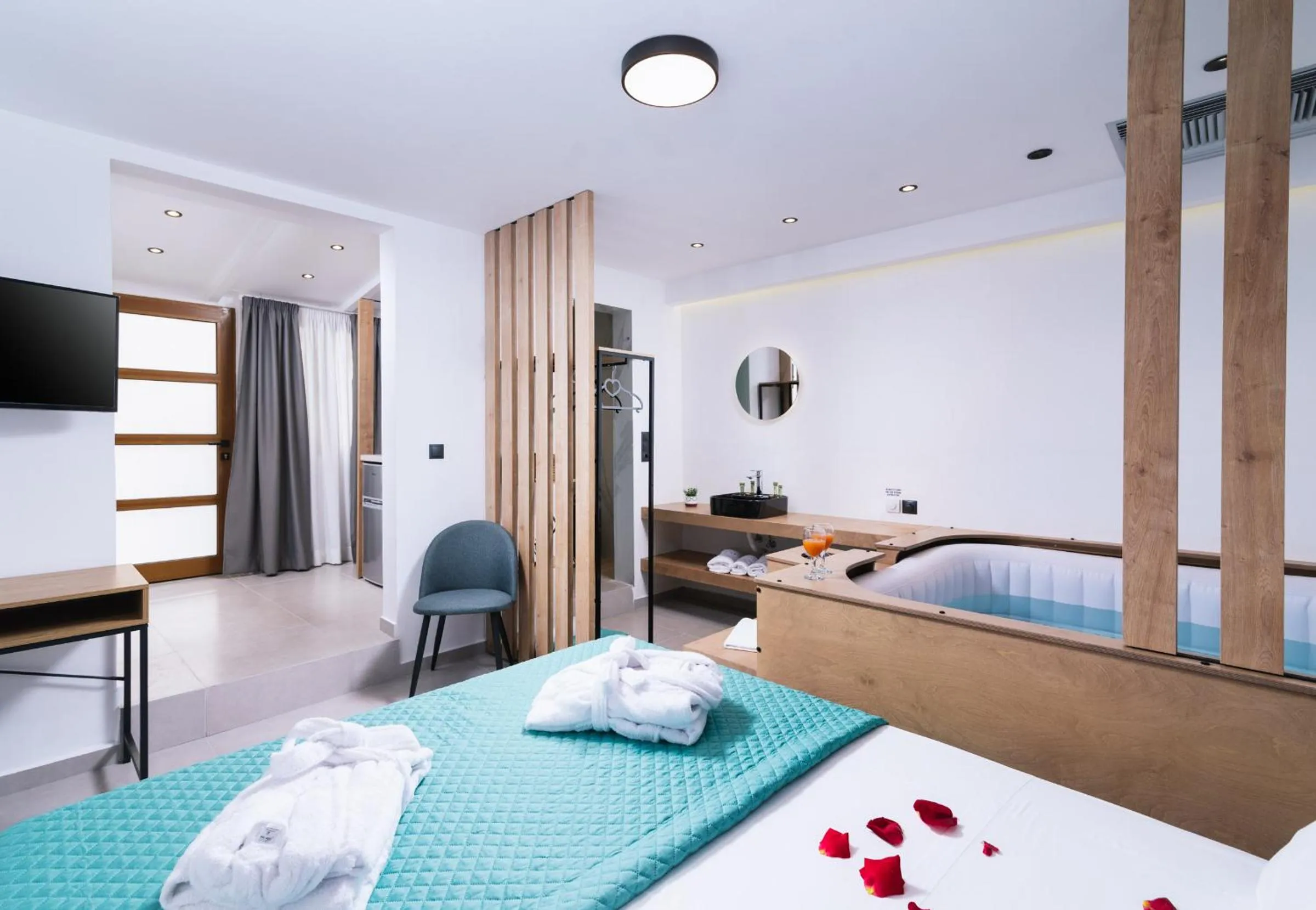 Bed in Alcyone Studios and Apartments