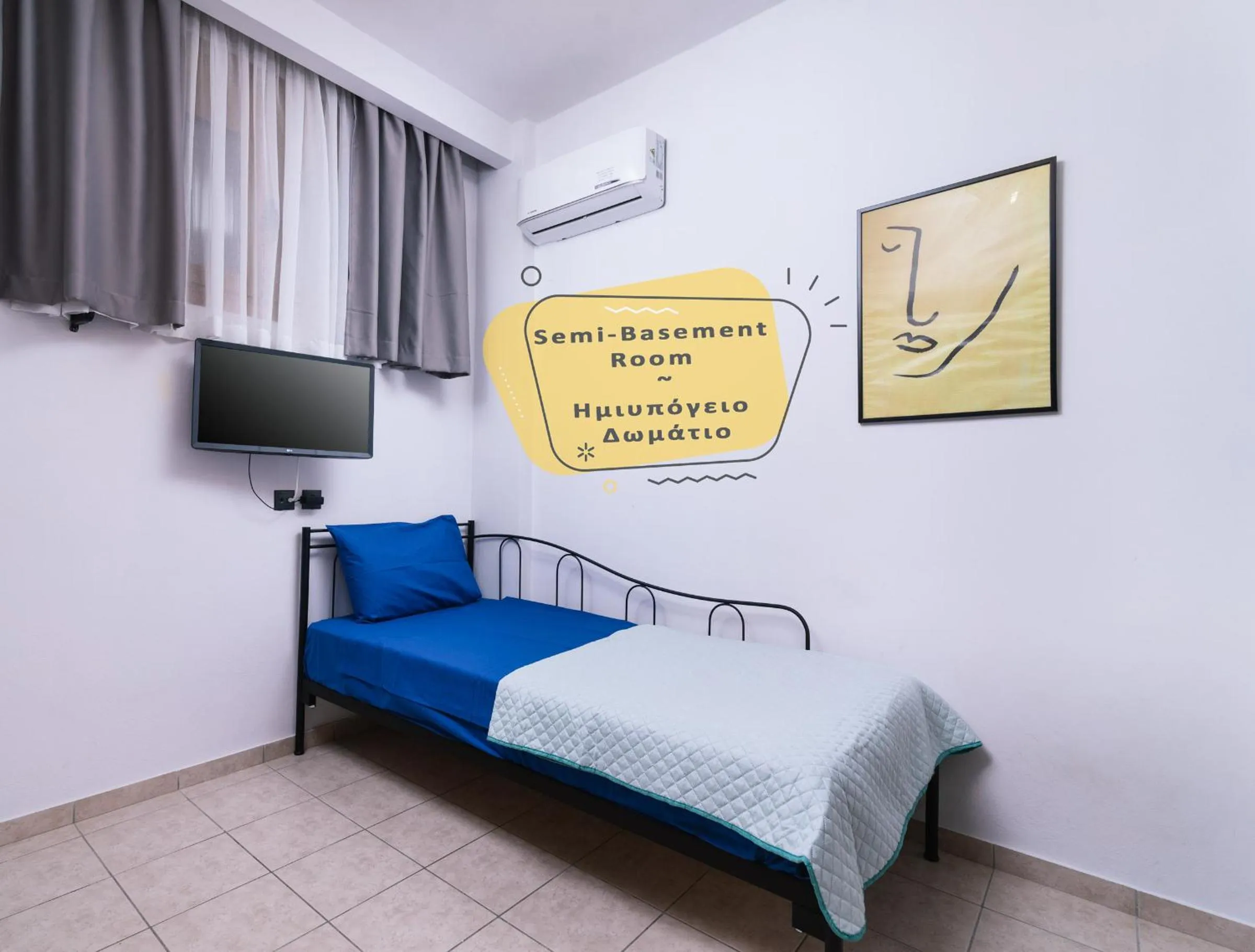 Bed in Alcyone Studios and Apartments