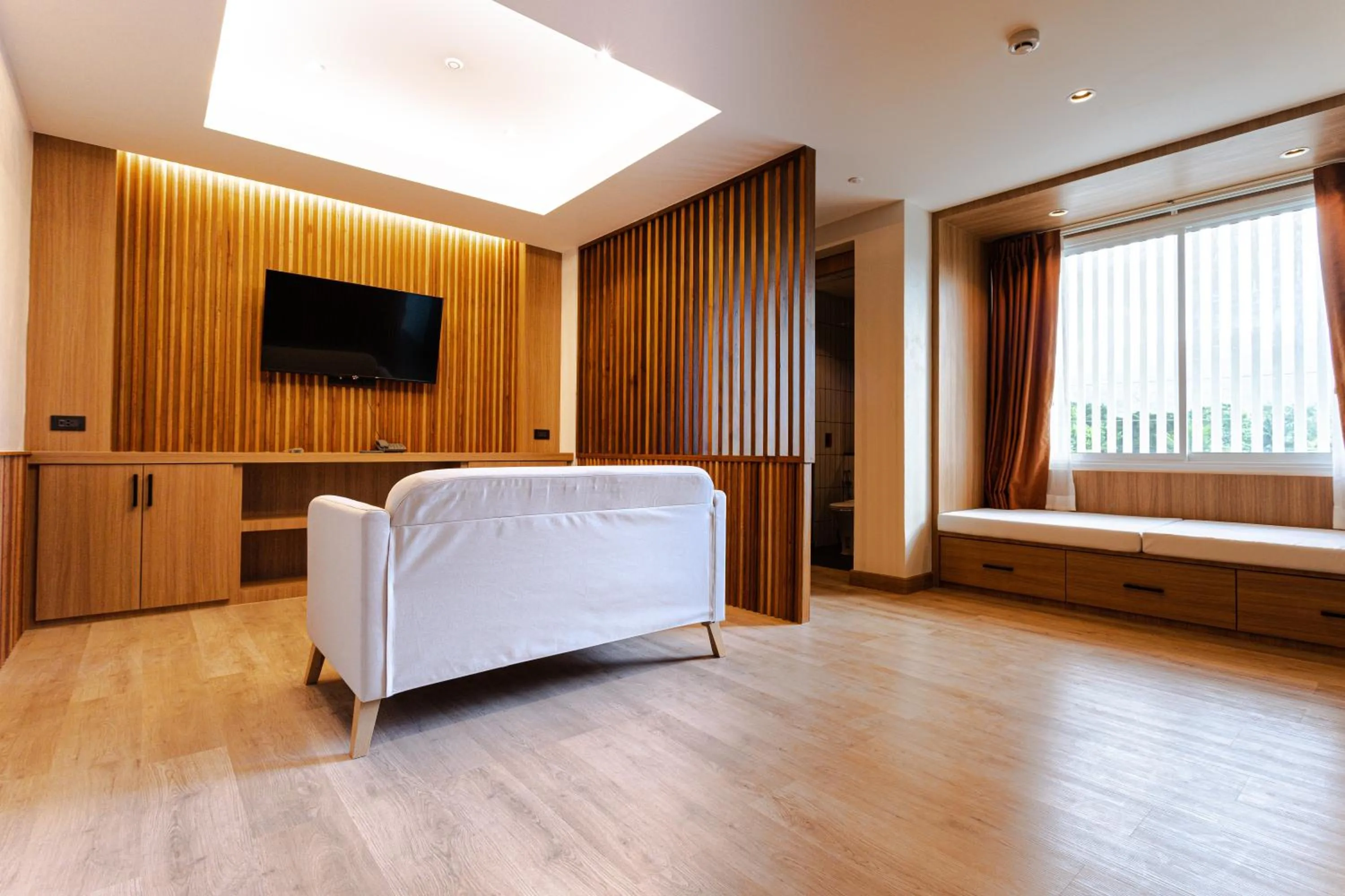 Communal lounge/ TV room in Nakornping Boutique Hotel