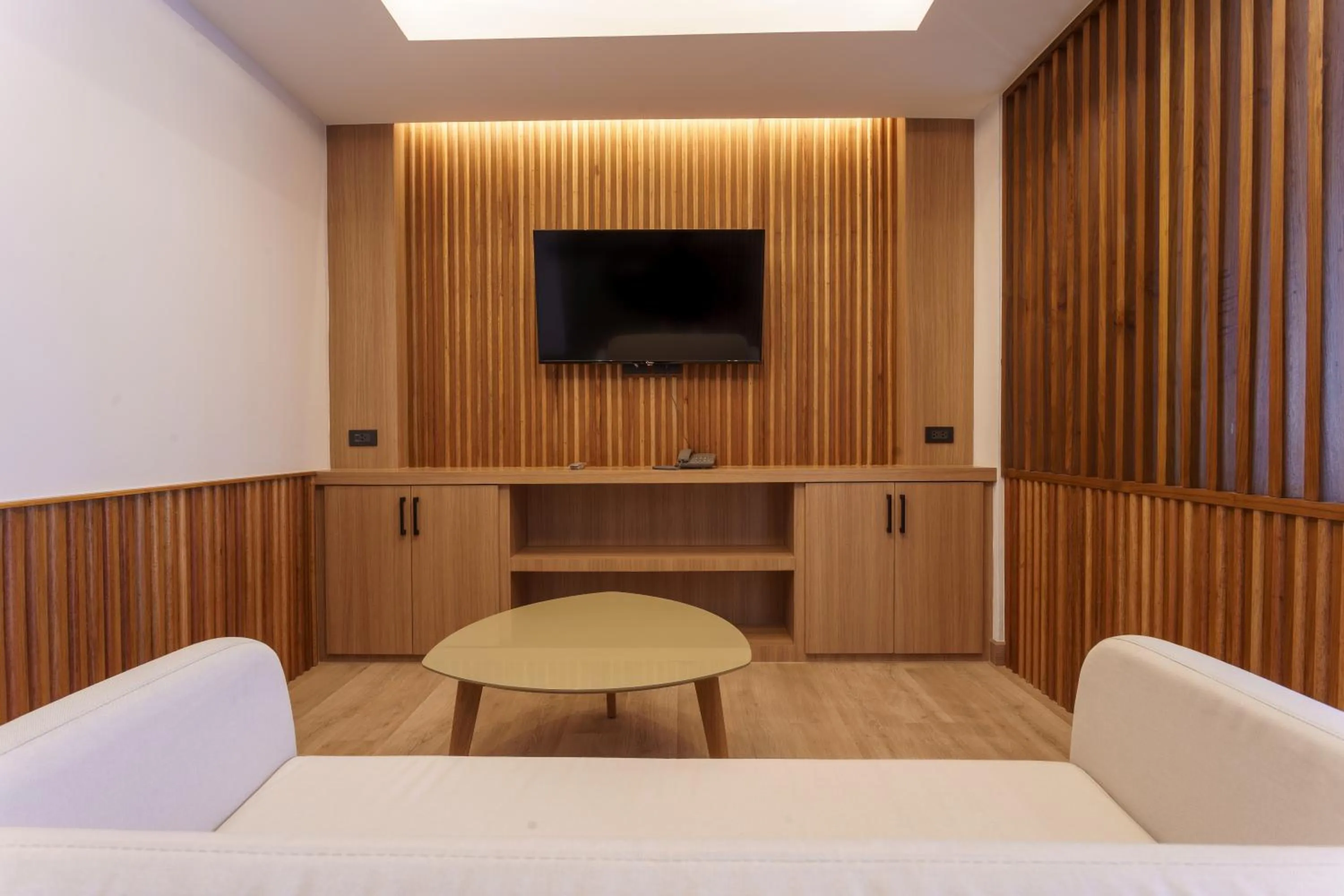 Communal lounge/ TV room in Nakornping Boutique Hotel