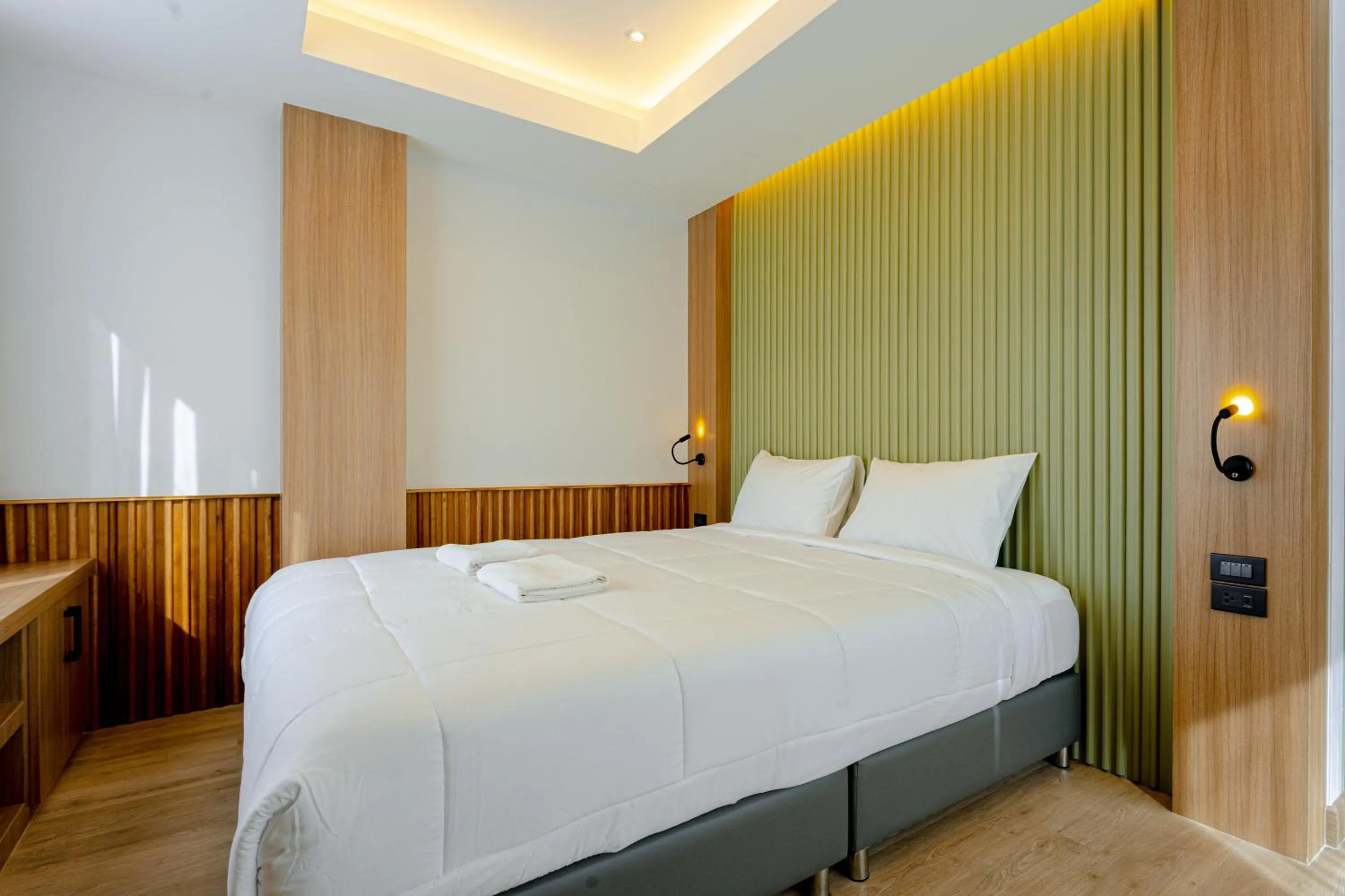 Bed in Nakornping Boutique Hotel