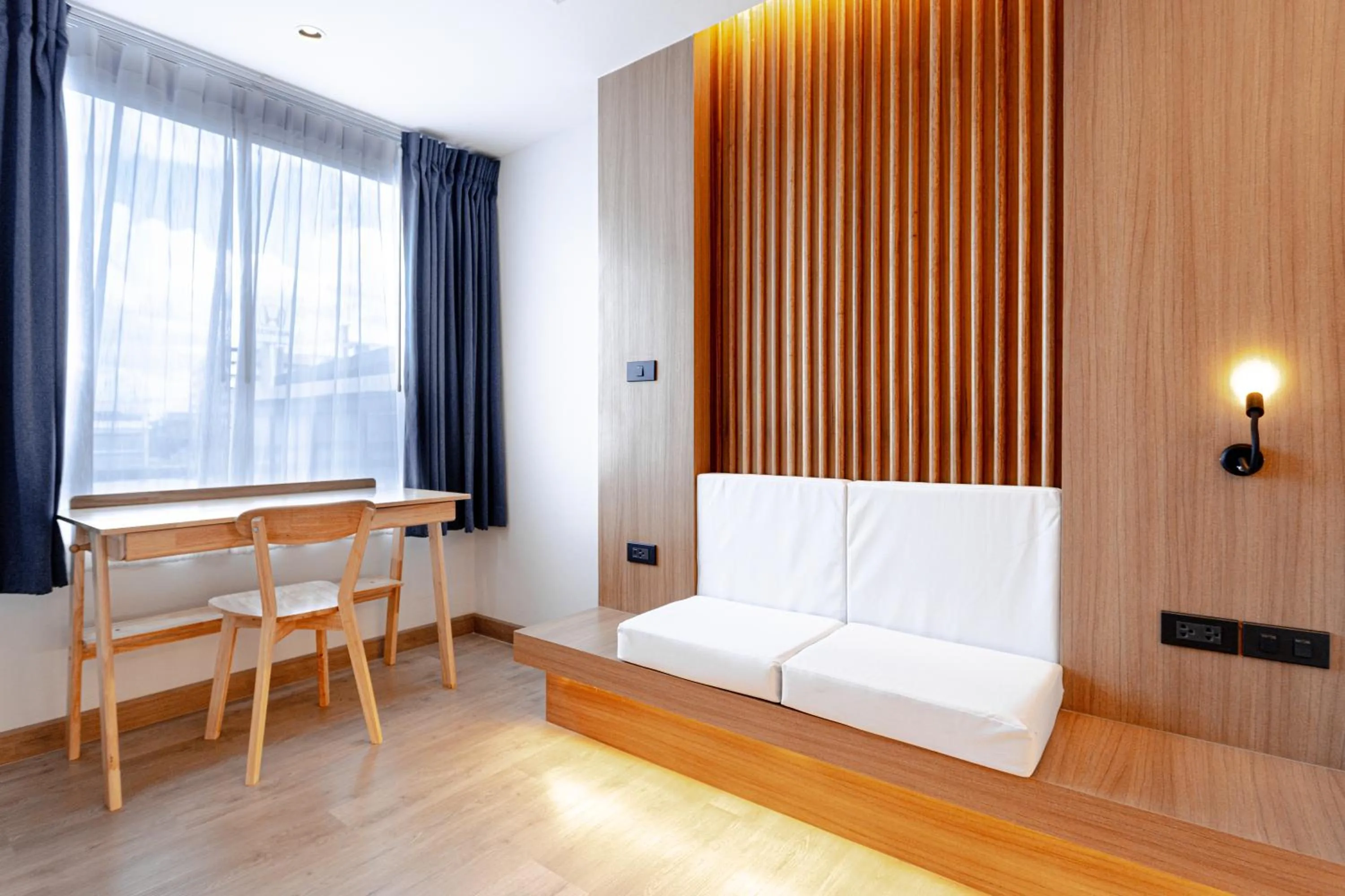 Seating area, Bed in Nakornping Boutique Hotel