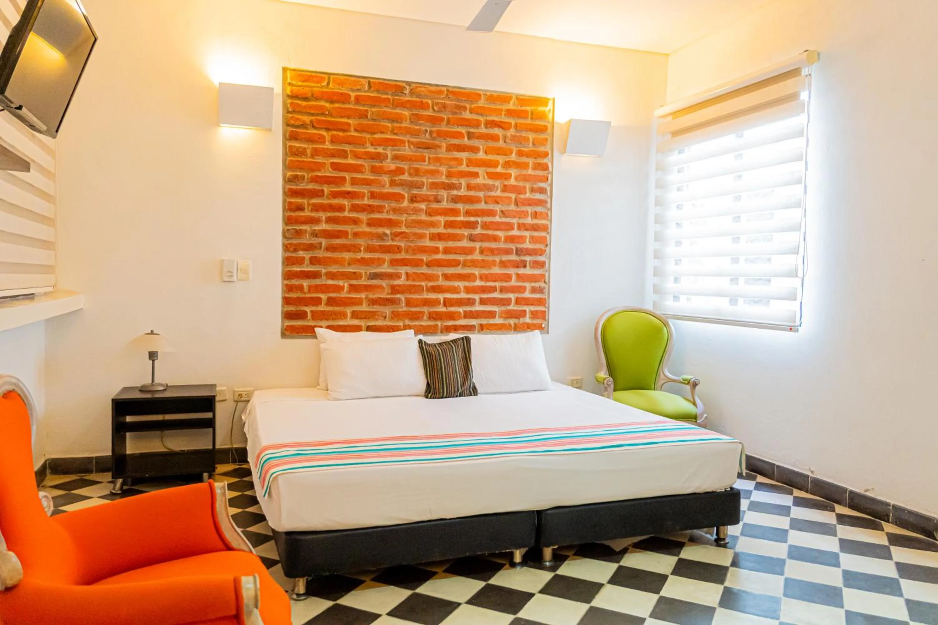 Bed in Hotel Puerto Pelicano