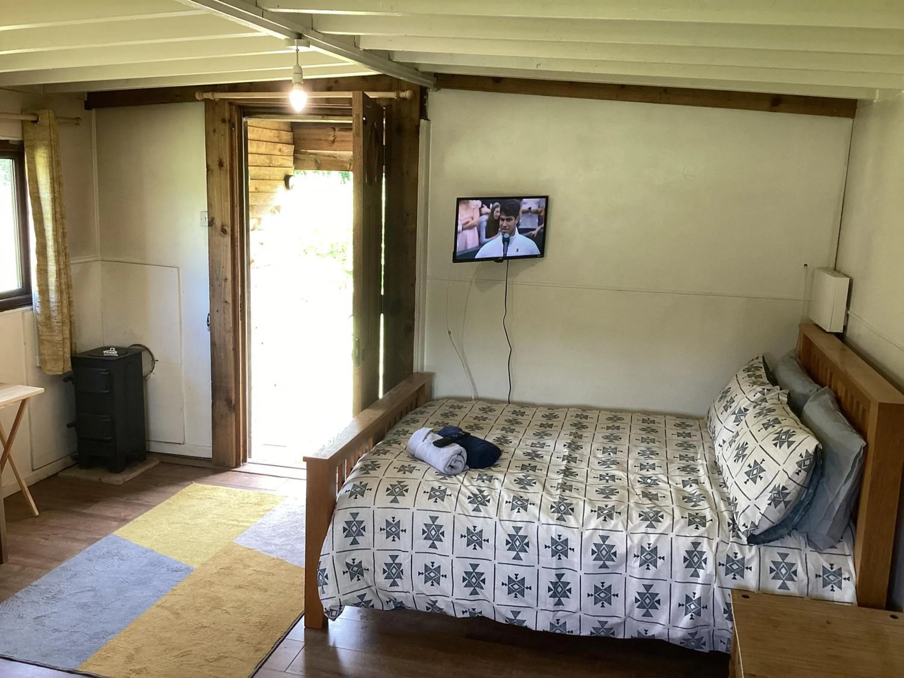 Bed in Vigo Retreat cabin 3