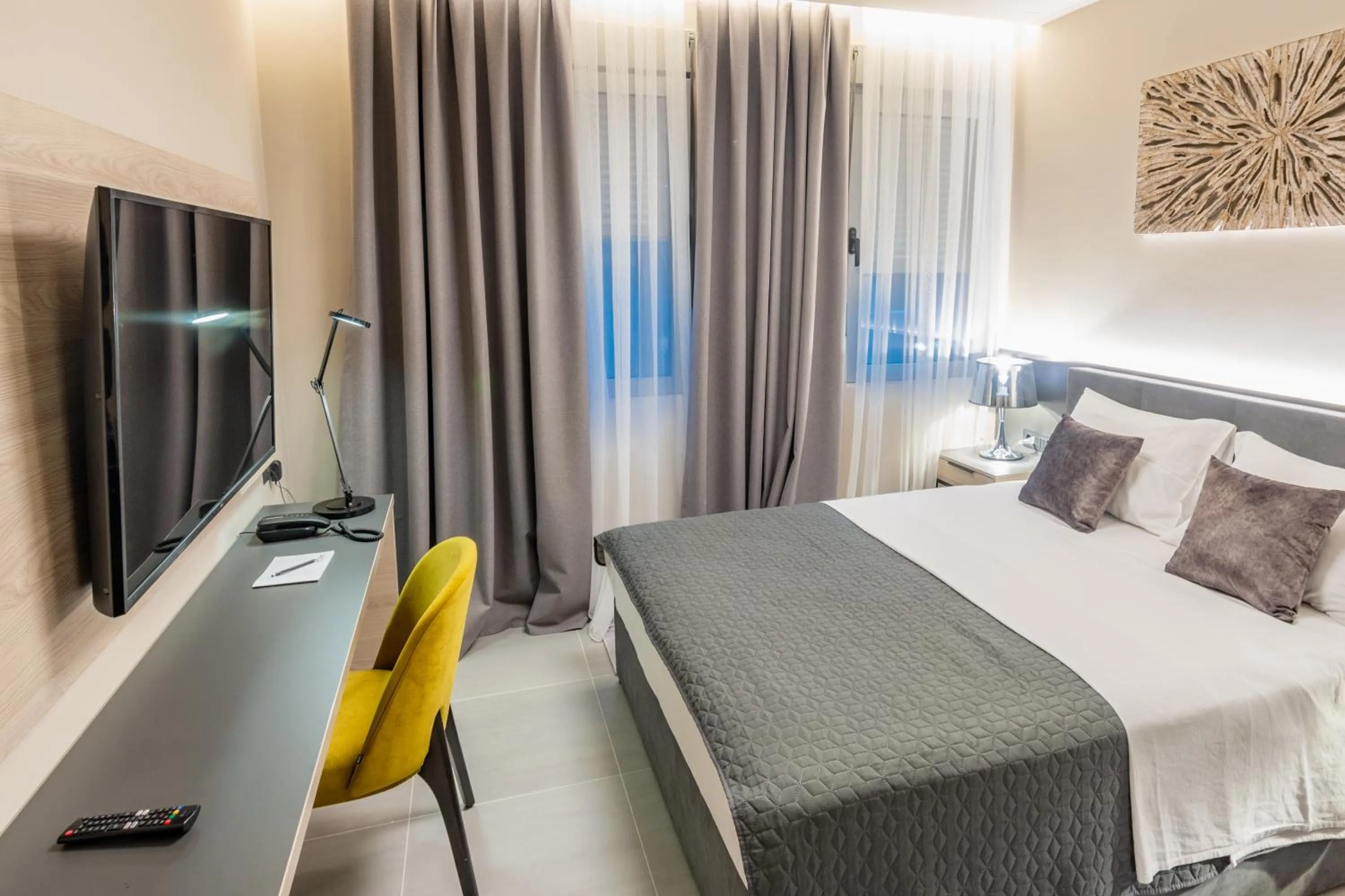 Bed in Garni Hotel Kruso