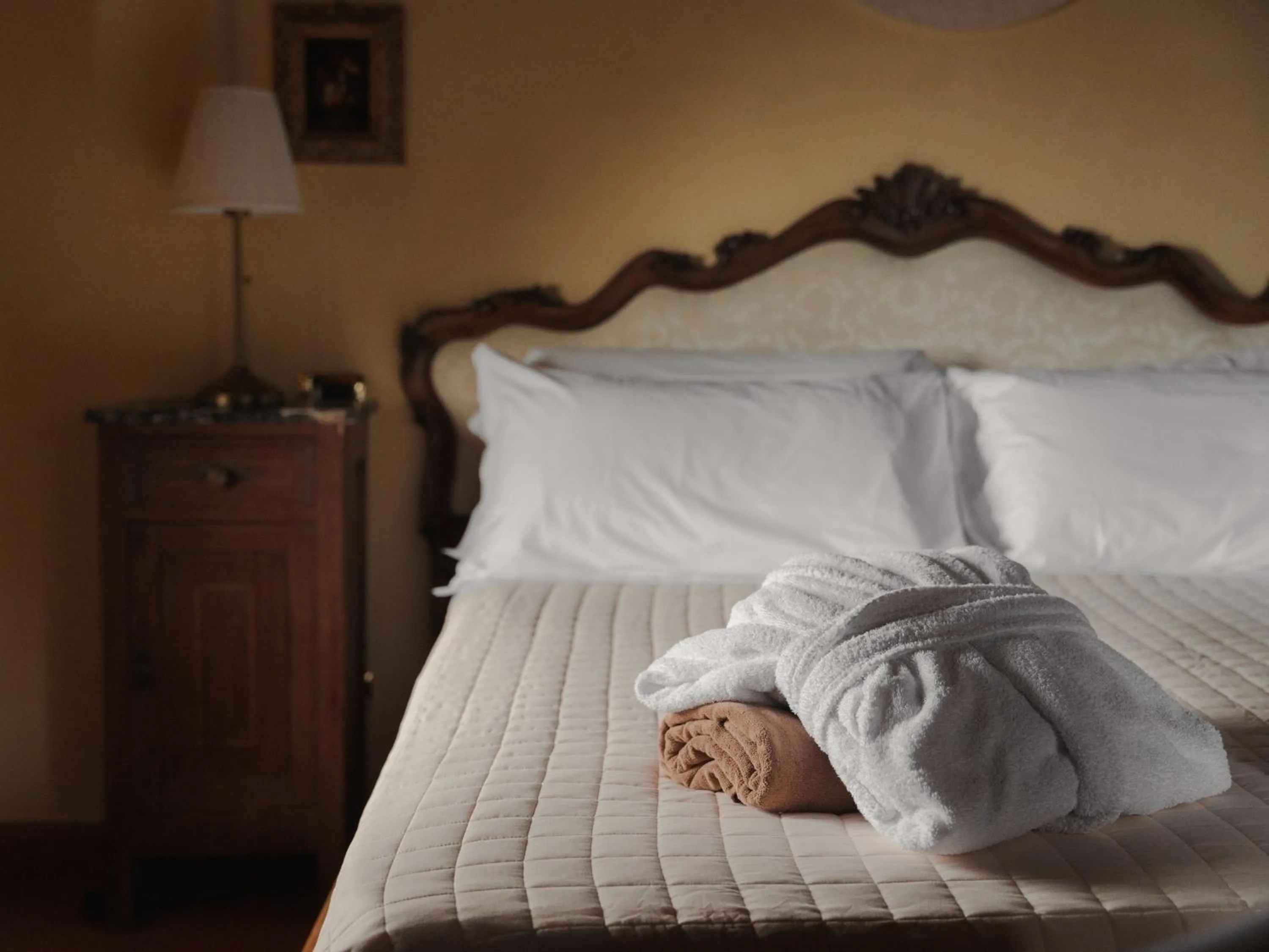 Bed in Relais Villa La Cappella