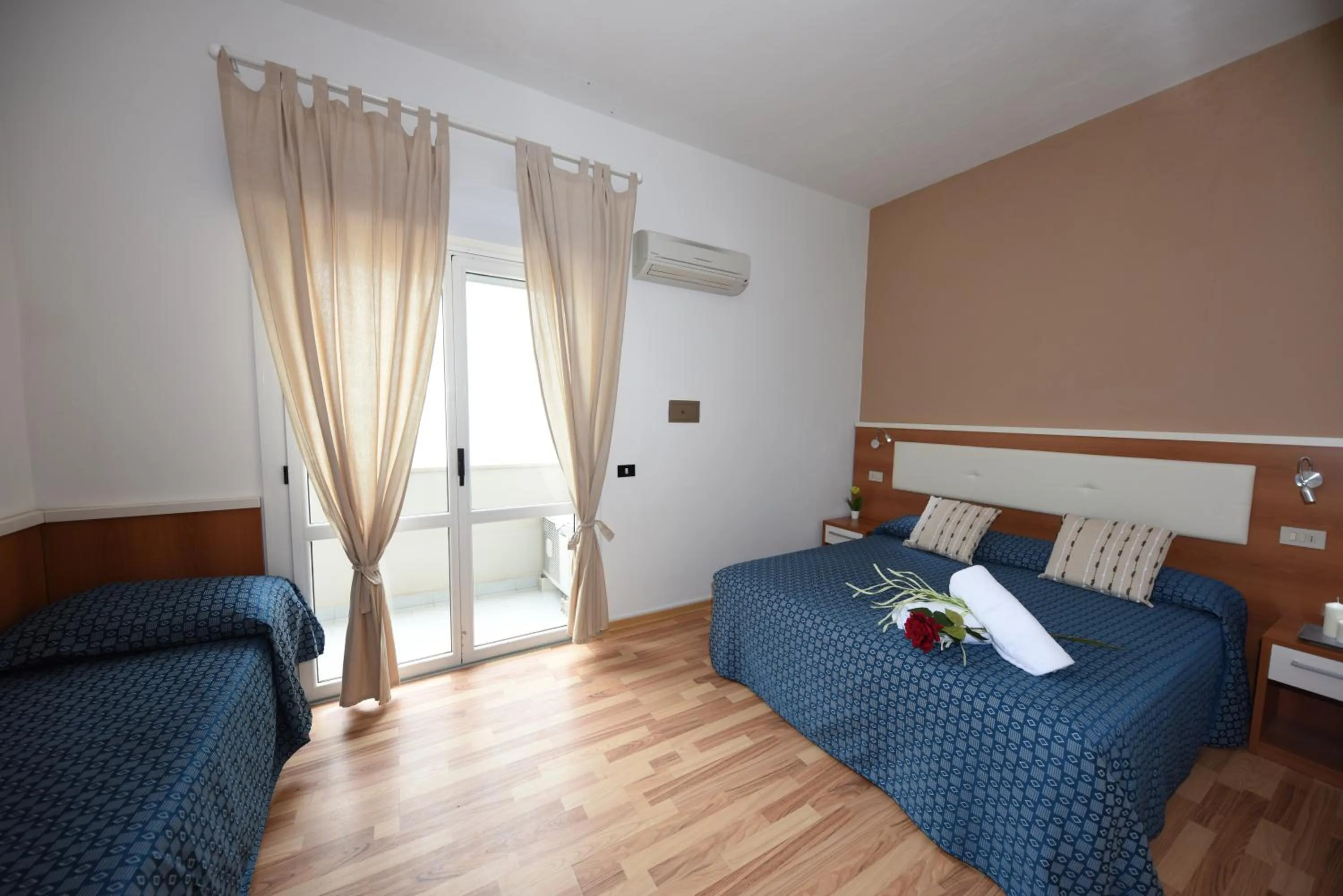 Photo of the whole room, Bed in Miramare Inn Hotel