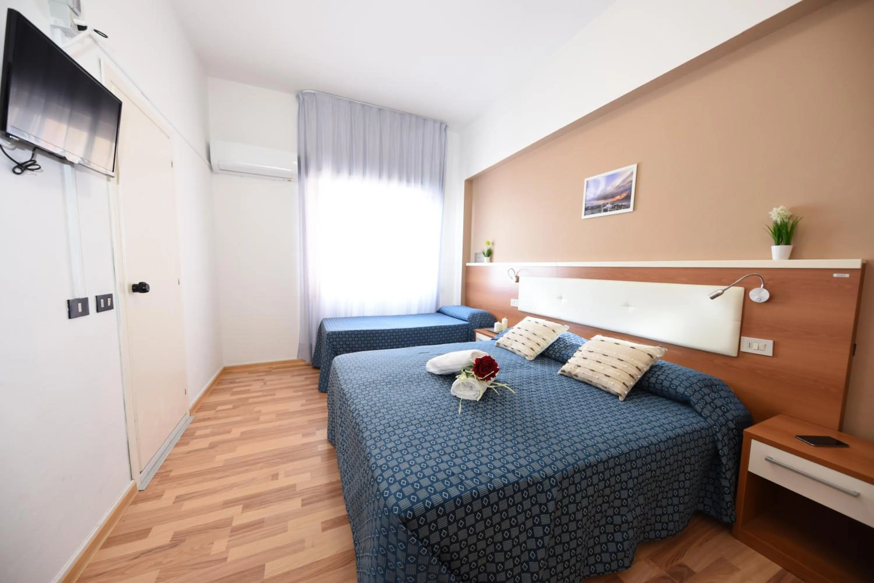 Photo of the whole room, Bed in Miramare Inn Hotel