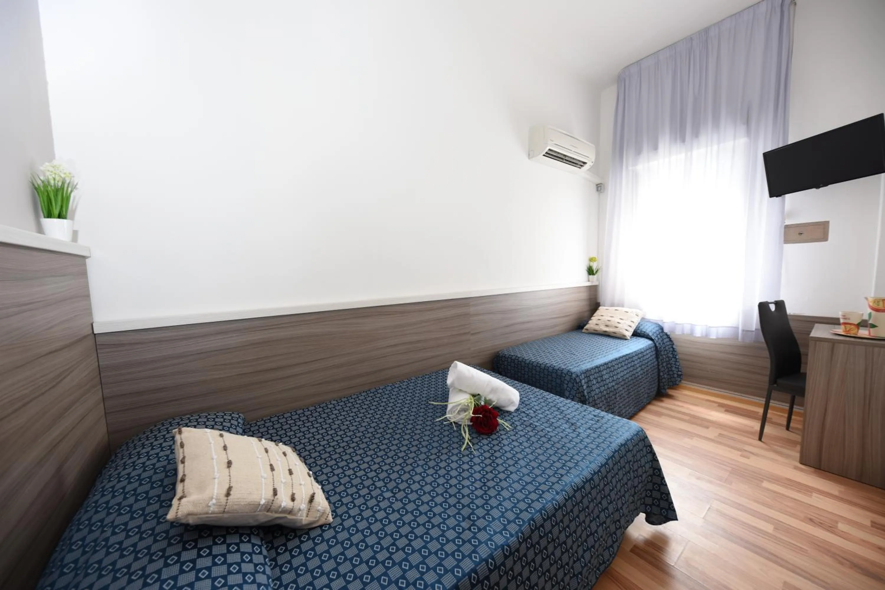 Photo of the whole room, Bed in Miramare Inn Hotel