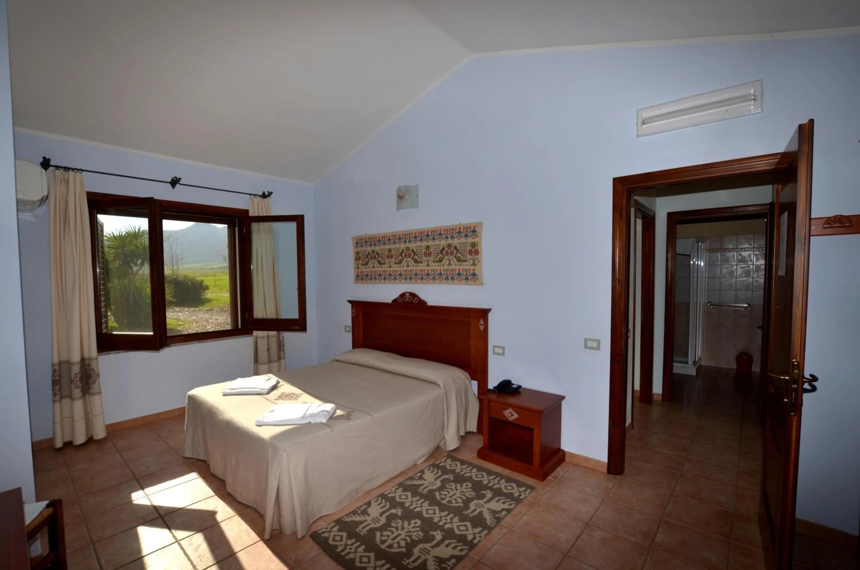 Bedroom, Bed in Albergo Ristorante Pizzeria Monte Arcosu