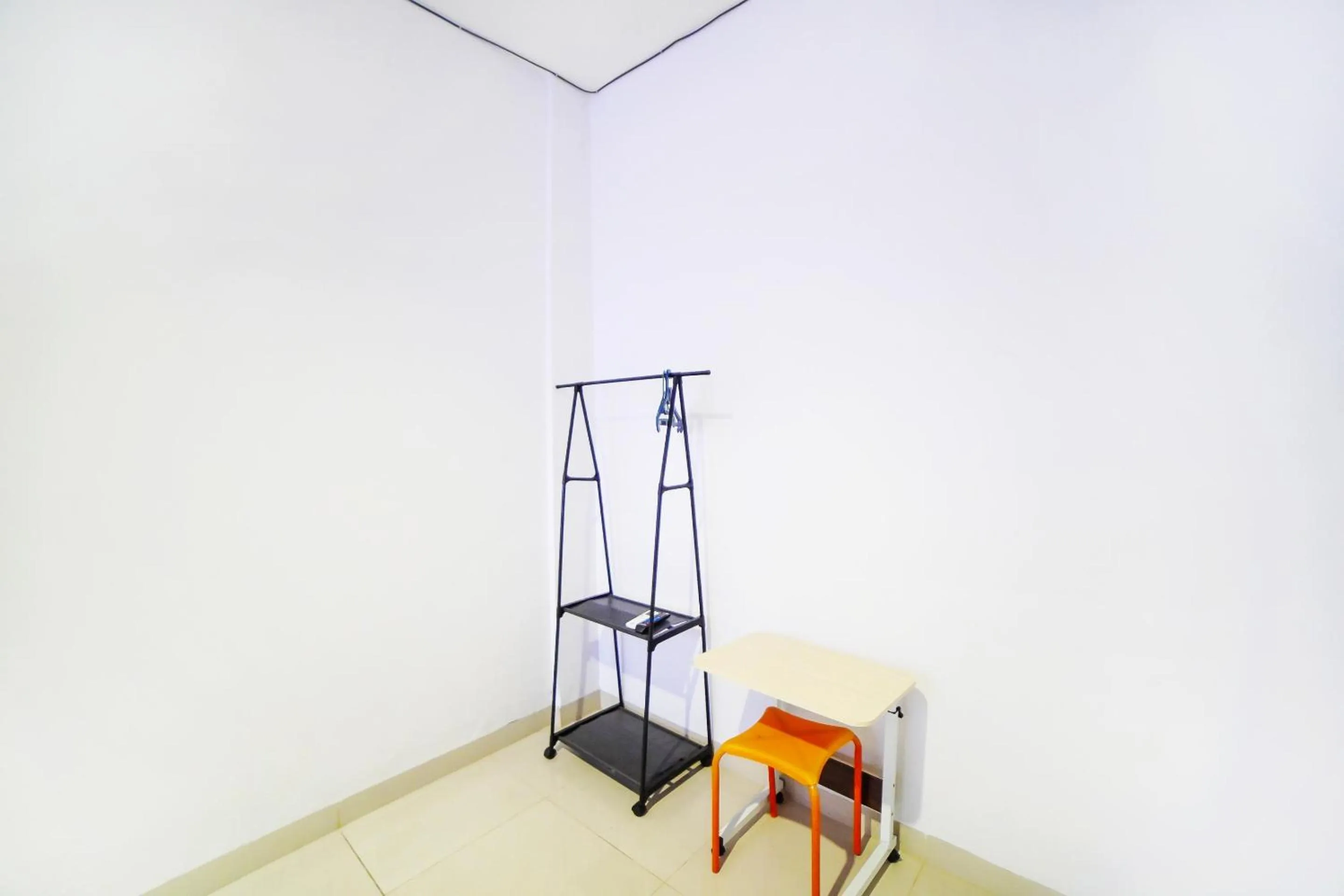 Bedroom in OYO 91283 Sg Premium Guest House