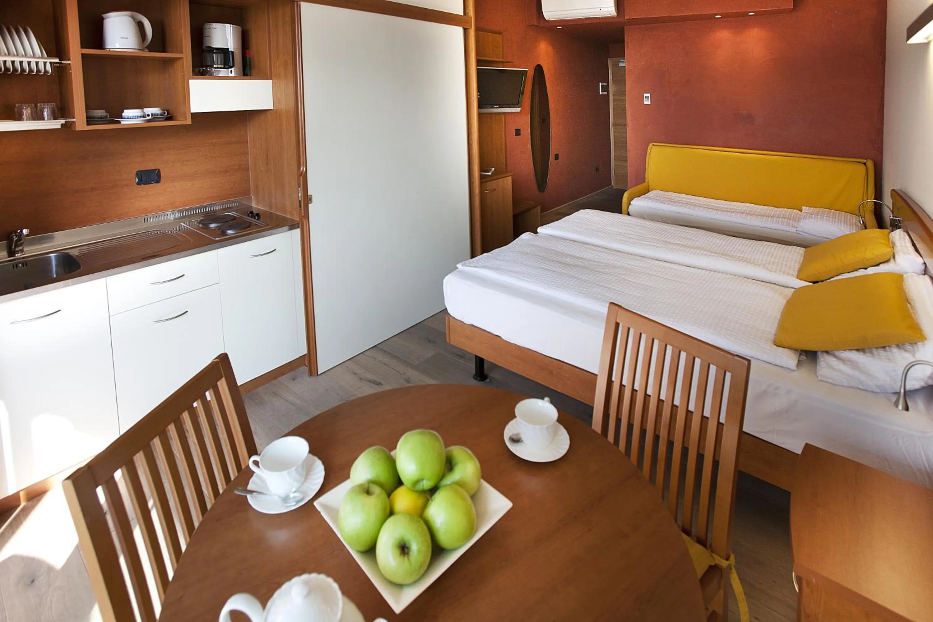 Kitchen or kitchenette, Bed in Ambienthotel Spiaggia